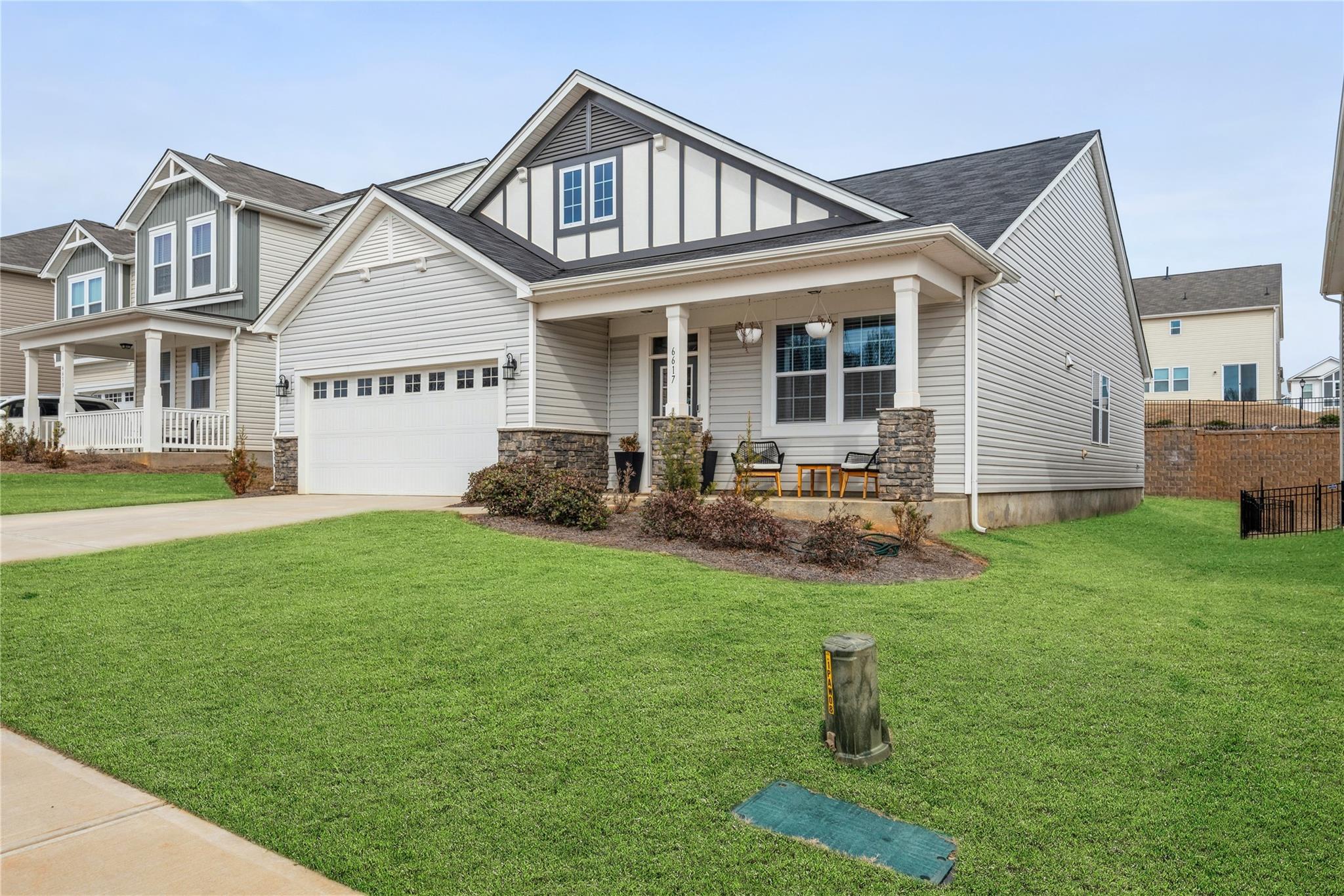 Want a new home without the wait? This home has all the upgrades and is waiting for its new owner. Three-bedroom split plan with an open floor plan. Flex room could be a dining room, second sitting room or office. Put your belongings in the drop zone upon entering through the garage. Kitchen offers a pantry, stainless-steel appliances and a large center island with a breakfast bar adjoining the great room. Spacious primary bedroom with en-suite. Loads of natural light in this home. Maintenance free luxury vinyl plank flooring on most of the main. Enjoy the community pool and playground, or just hang out on the covered front porch. Close to shopping and highway. Showings begin Sunday 1 pm