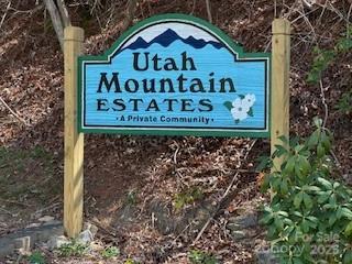 Well priced lot 2.3 acre lot in established Utah Mountain Estates, wooded/sloping. Perfect for full time or seasonal home. Utah Mtn. Road turns onto Tuckaway. Winter views which can be enhanced with tree trimming. Enjoy cooler summer weather at this elevation. Lot perked 3bd septic.