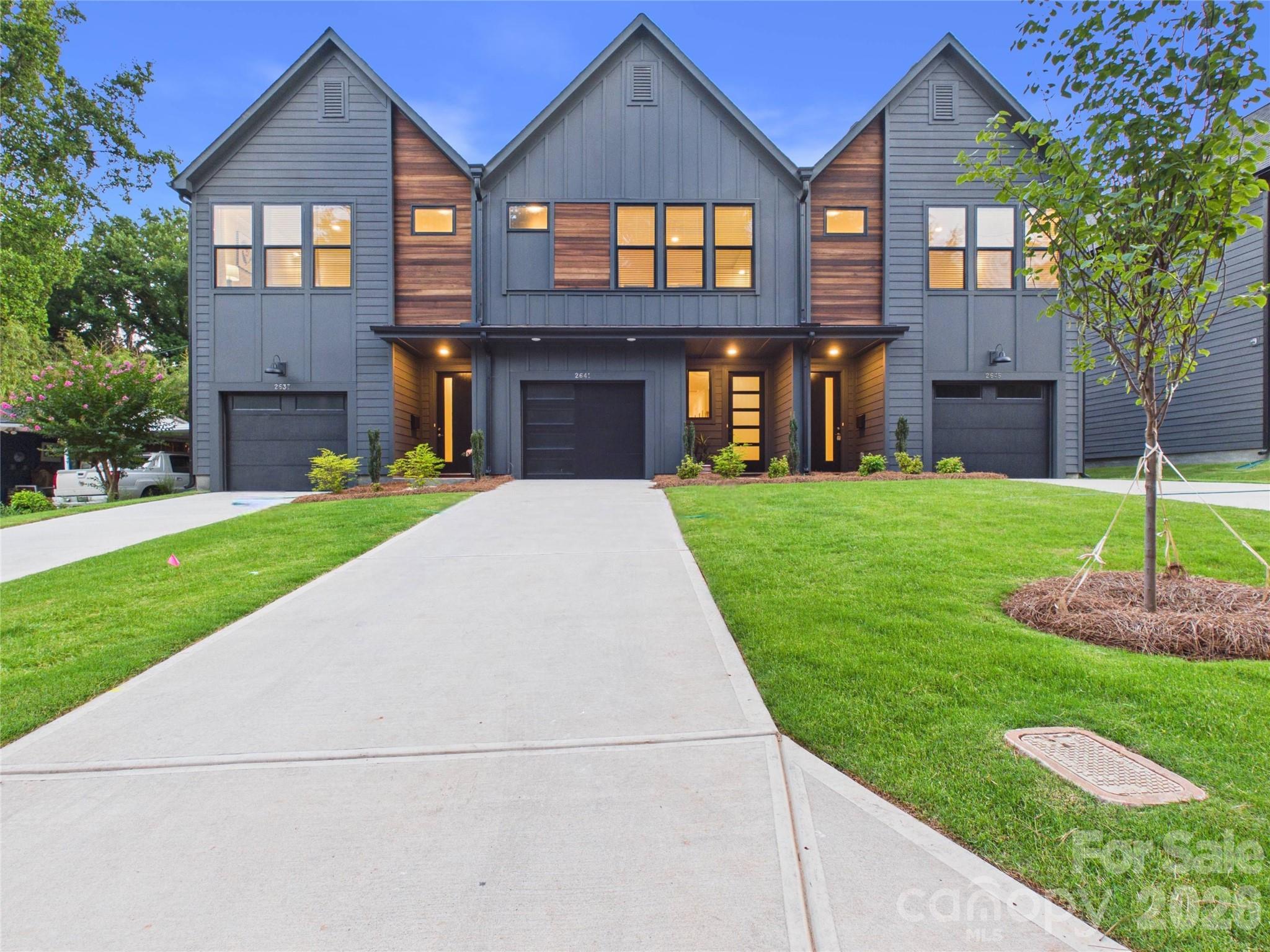 Welcome to the Ravencroft Townhomes - a collection of 10 modern new homes on the edge of Enderly Park and Smallwood. Ravencroft Drive is tucked back next to Martin Luther King Park and Stewart Creek Greenway, which offers pickleball and basketball courts, a soccer field and playground. This open-concept layout is the largest floorplan and only one available in the first phase. This home features a spacious primary suite, 3.5 bathrooms and an upstairs loft for a media room or office.  Soft close cabinets, built-in pantry and linen cabinets with roll-out shelves, quartz countertops and 9' ceilings on both floors add a touch of luxury. With a private patio out back and a breakfast bar that seats up to 8, enjoy the best of indoor-outdoor living near Uptown and Wesley Heights. The West End is growing quickly. Located minutes from neighborhood coffee shops, restaurants and fitness options. Enjoy low maintenance living with easy access across the park via the greenway to The Thread (opening 2027) at Savona Mill featuring 25 food stalls, a coffee shop, rooftop bar and flower market. Seller offering up to $15k toward closing costs with a preferred lender. Schedule your tour today!