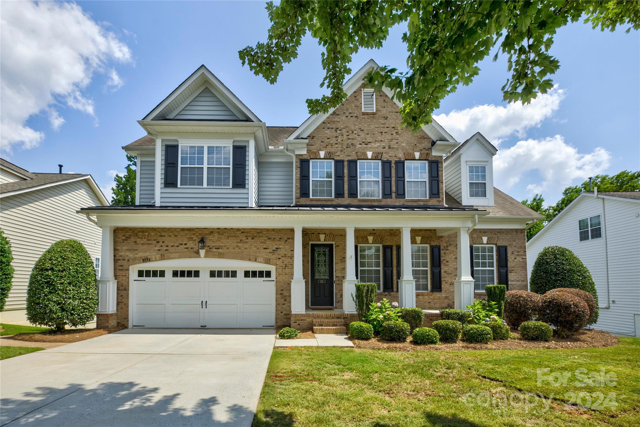 Spacious finished basement home in Ft. Mill.  Hardwood floors, high ceilings, crown molding, & convenient drop zone as you walk in the front door.  The two story great room w/ built in entertainment system, gas fireplace, tall windows & filled by natural light.  Open kitchen overlooks the great room w/ eat in area, breakfast bar, double oven, gas range & walk-in pantry. 

Primary on main; ensuite w/separate shower and tub, dual vanity & walk-in closet. Four bedrooms upstairs w/their own unique size and features; one of which has an ensuite bath.  Options for an office or additional flex room.

Walk-out finished basement w/ bedroom, full bath, media room with wet bar, living/flex space & screened in patio.  Enjoy the flat fenced back yard from the deck or patio.  A short walk to the community amenities that feature clubhouse, pool, pickleball court, play ground, and airnasium. Fort Mill school assignment should be verified (current enrollment freeze for PKMS).