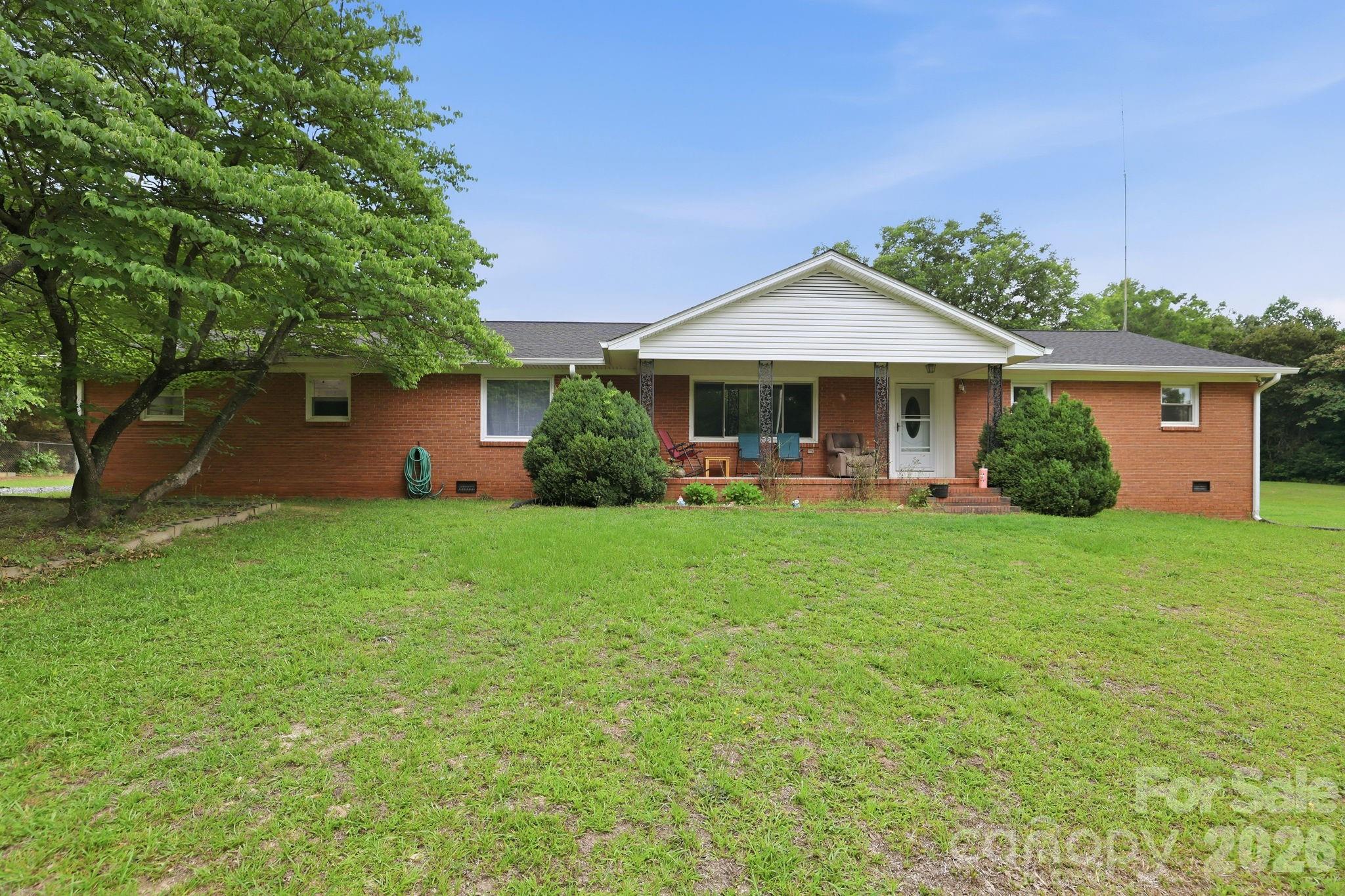 Rare opportunity at 364 Dana Drive in Catawba, SC. This unique property includes two parcels totaling approximately 5 acres, offering space, flexibility, and future potential. The existing home has been completely updated on the interior with sheetrock throughout, updated flooring, fresh paint, granite kitchen countertops, newer kitchen cabinets, recessed lighting, updated trim, roof (2024) and renovated bathrooms.

A large, newly added attached two-car garage provides excellent everyday parking, storage, and convenience, complete with upgraded garage features and garage door opener. The large fenced property also includes multiple outbuildings, a huge metal building with oversized pull-up doors, a large covered carport with power, and plenty of room for boats, campers, equipment, storage, hobbies, or animals.

The seller has added electricity to the rear building, multiple exterior water spigots, app-controlled garage door and temperature features, and internet cable outlets in multiple rooms.

With two separate parcels, there may be options for an additional homesite, subdivision, or future building plans, subject to county approval and buyer verification. This is a great fit for someone looking for land, privacy, storage, workspace, and a move-in-ready home with modern interior updates.