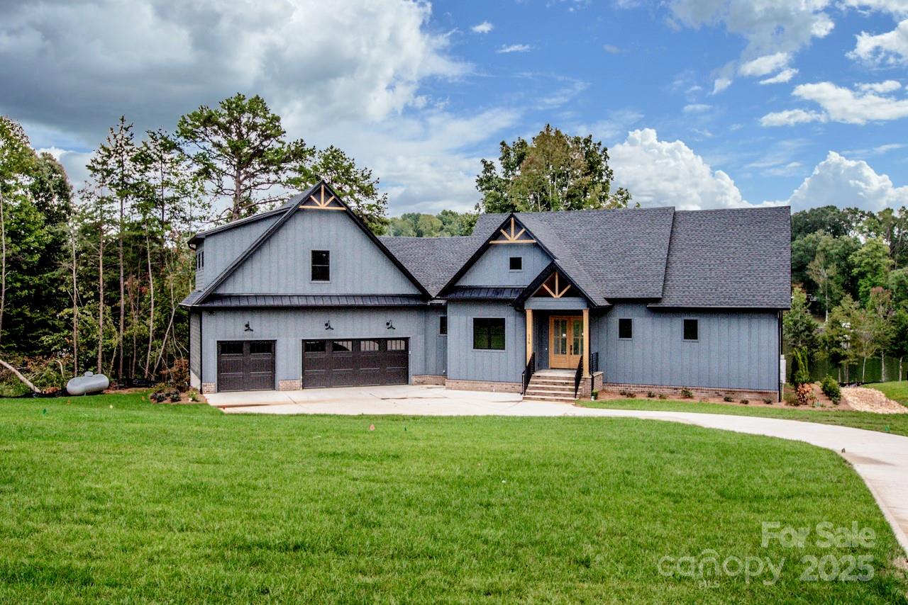 Custom Troutman estate featuring 4 bedrooms and 4 bathrooms on a beautiful 1.5 acre waterfront lot with stunning Lake Norman views. There is also a large bonus room with a full bath upstairs.   Well equipped Chef's kitchen with a main level open concept. Tons of storage! There is an expansive outdoor entertaining space with covered porches and a walkout basement leading to the in-ground pool with jacuzzi.  The builder has permitted the dock with Duke Energy through Lancaster Docks.  The Builder is offering a 50,000 ALLOWANCE FOR THE DOCK.  (Please note there has been a recent street name change where this home is located. Google maps will reflect the new name Zwilling Court.)