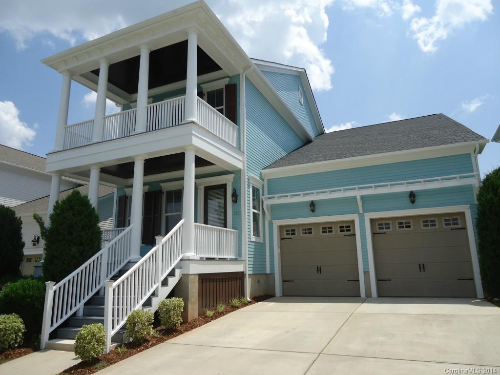 Beautiful golf villa home in prime location  on Springfield golf course! Beautiful view of 1st fairway & practice range. Charleston style double front porches. Light and airy interior with 10 foot ceilings upstairs and downstairs. Original owner- custom built with all of the upgrades including GE Monogram and Profile stainless steel appliances, ventilation hood, wine refrigerator, oversized cabinets and stacked lighted glass front units, large island, custom light fixtures, beautiful granite counters, screened porch, tankless water heater. Immaculate condition! Exterior just completely painted. Sealed crawl space.