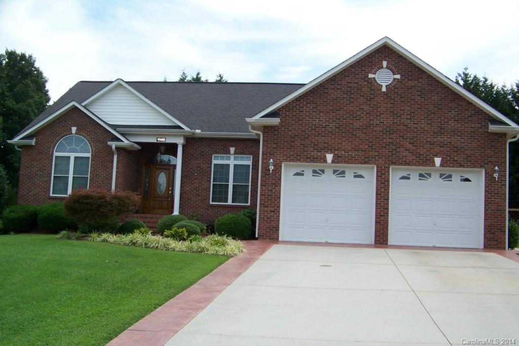 Custom home built in 2001. Home w/all hardwoods, crown molding, throughout the living area & MBR. Cathedral ceiling in Great room & Arch doorway to the dining room. Kitchen w/cabinets galore, pantry, desk area & moveable kitchen island w/additional cabinets. Laundry room w/sink leads to 2 car garage w/pull down attic (tall enough to be finished later if desired). In-ground pool w/ large patio & there is even a full bath outside w/storage area on the back.