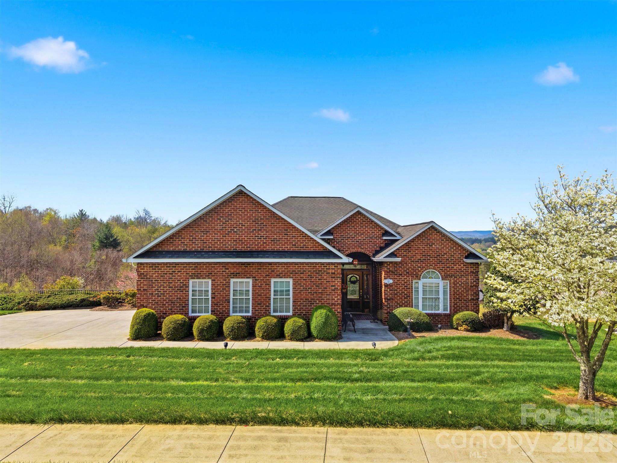 THIS COULD BE THE ONE YOU HAVE BEEN WAITING FOR! 

Custom-built, one-owner home offering breathtaking mountain views from almost every room. This beautifully maintained home was designed to capture the scenery while providing comfortable everyday living. The open floor plan features a breakfast bar, spacious dining area with bayed windows, study with built-ins, and a nice-sized laundry room. Gorgeous hardwood floors run throughout much of the home, while the sunroom with wall-to-wall windows provides a stunning place to relax and enjoy the views in every season.

The main level includes a spacious primary suite with bayed windows, walk-in closet, jetted tub, and walk-in shower, as well as an additional bedroom and full bath. An oversized main-level garage adds convenience and functionality.

Downstairs, the basement offers a separate living area perfect for guests, recreation, or multi-purpose use. Outside, you’ll find a patio with views, a beautifully manicured. 

Conveniently located. Enjoy being just minutes from shopping, medical facilities, Lenoir’s Greenway, and restaurants, with both Hickory and Blowing Rock only about 30 minutes away.