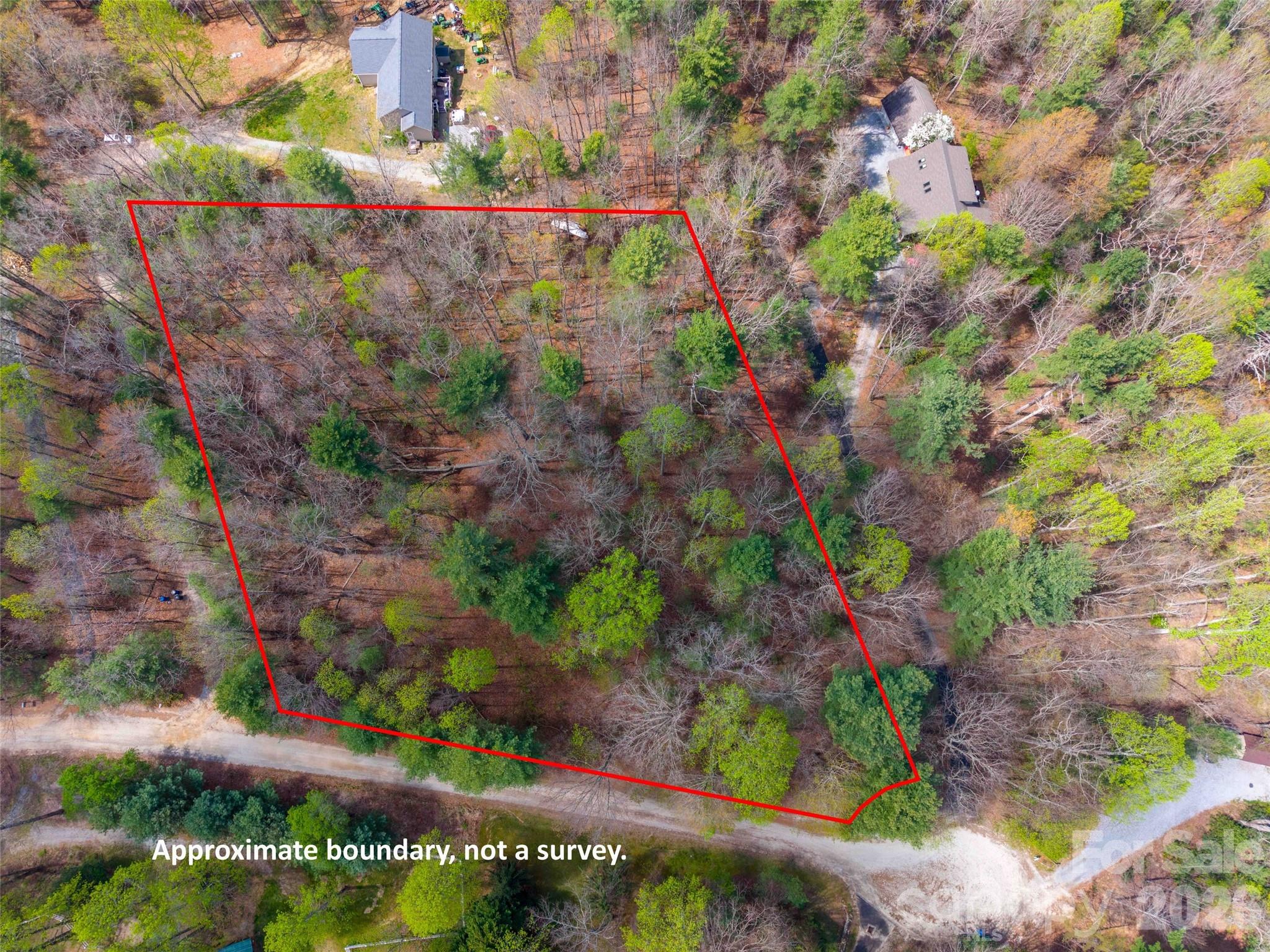 Tucked away in the desirable Green River Estates Subdivision, this beautiful 1.82-acre lot offers the perfect blend of privacy, convenience, and mountain living. With a great buildable homesite, this wooded property provides an ideal setting for your dream home or mountain retreat. Enjoy the peaceful surroundings while being just minutes from I-26, Historic Downtown Saluda, local shops, dining, and outdoor recreation. A rare opportunity to own a private slice of Western North Carolina with easy access to everything the area has to offer.