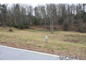 Unique 2ac. Kenmure homesite is located in a low/no traffic cul-de-sac with a small cascading stream and waterfall.4-bedroom septic permit available.  Value priced for larger homesite with easy buildsite. In an area of fine homes. Listing agent on site in clubhouse to assist with showings and to help coordinate builder consultation.