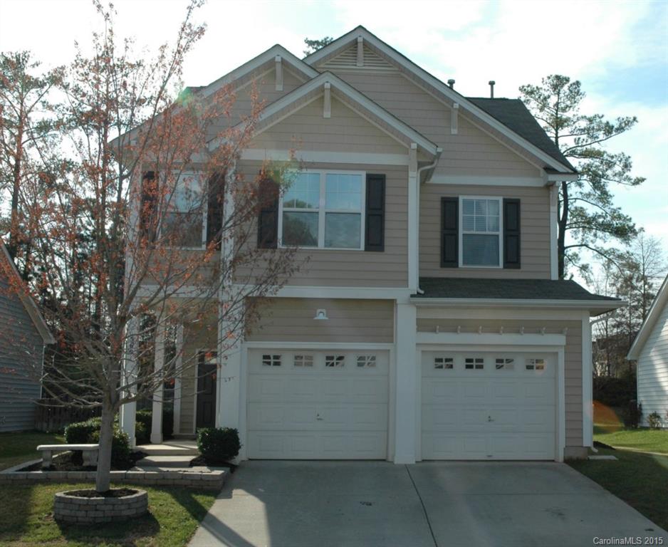 Beautiful 4 BR home with a large flat backyard! Glare protected windows, 9 foot ceilings, upgraded kitchen cabinets w glass block windows above for added light, breakfast bar has pendant lights. Convenient work island complete the kitchen. Generous size Master BR has trey ceiling. Bath has garden tub and separate shower, water closet, linen closet and large walk-in closet. The other 3 br are very nicely sized. Extra shelving built in the attic for storage. The home has just been freshly painted!