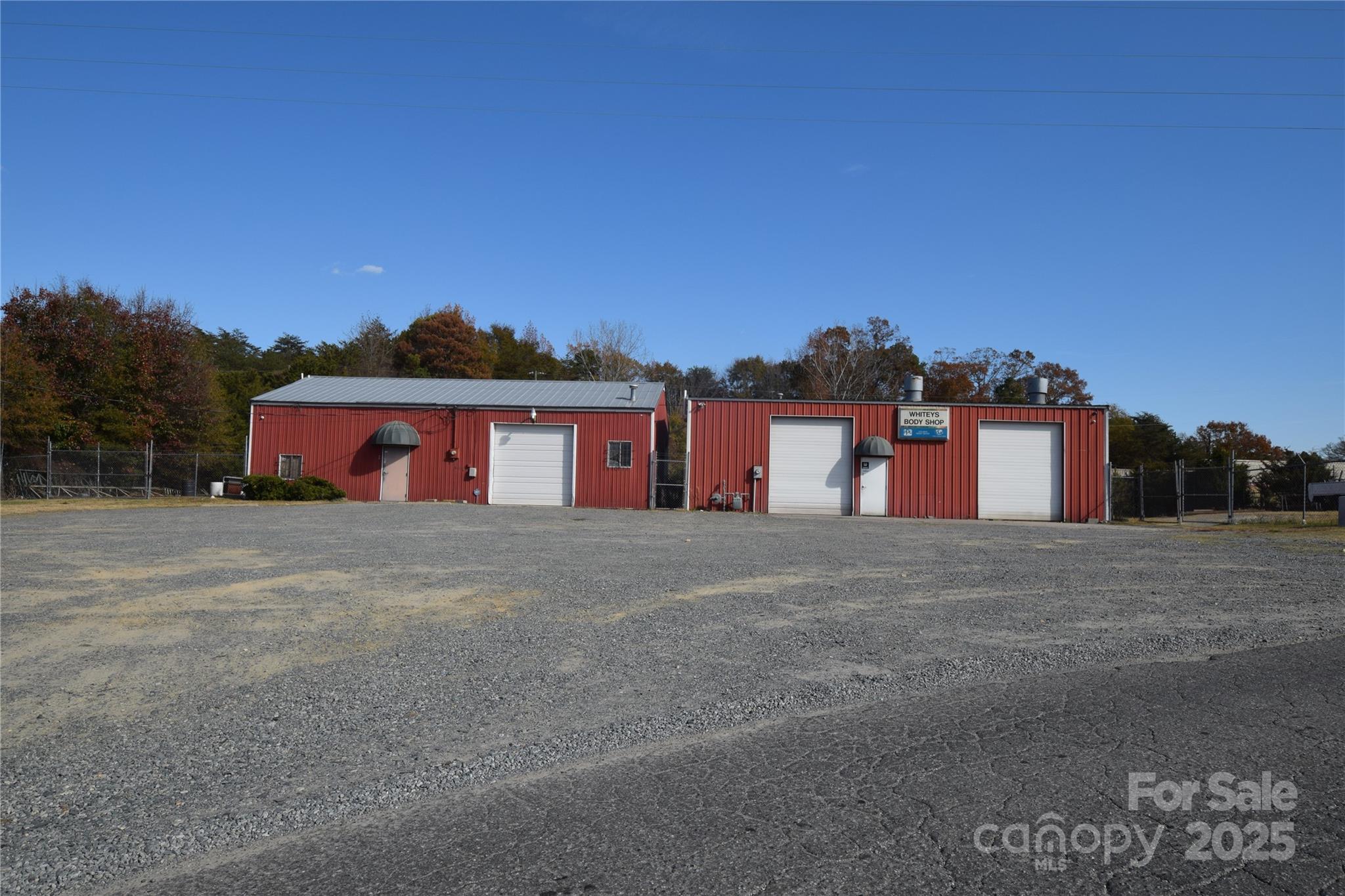 1.46 acres 2 parcels Zoned B-2 and General Business. Great location!! Presently used as a body shop. Paint Booth fenced storage behind warehouse with an additional 0.81 of an acre behind warehouse zoned general business. Call listing agent for information and showing details.