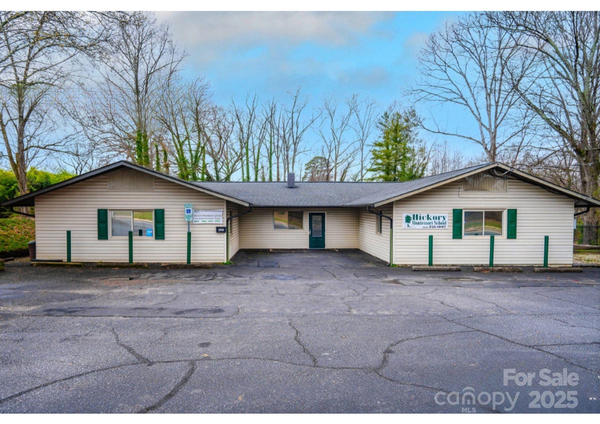 Prime commercial opportunity in the heart of Hickory! This versatile property offers excellent visibility and accessibility, making it ideal for a wide range of business uses. Previously utilized as a school, the building provides a functional layout with multiple rooms, open areas, and flexible space that can be adapted for offices, educational use, medical, retail, or specialty business operations.
Situated on a sizable lot with convenient access to major roads, the property offers ample parking and room for future improvements. Investors and owner-users alike will appreciate the potential for strong returns in this growing market. Whether you are expanding your portfolio or seeking a location for your business, this property is a rare find in an established Hickory corridor.