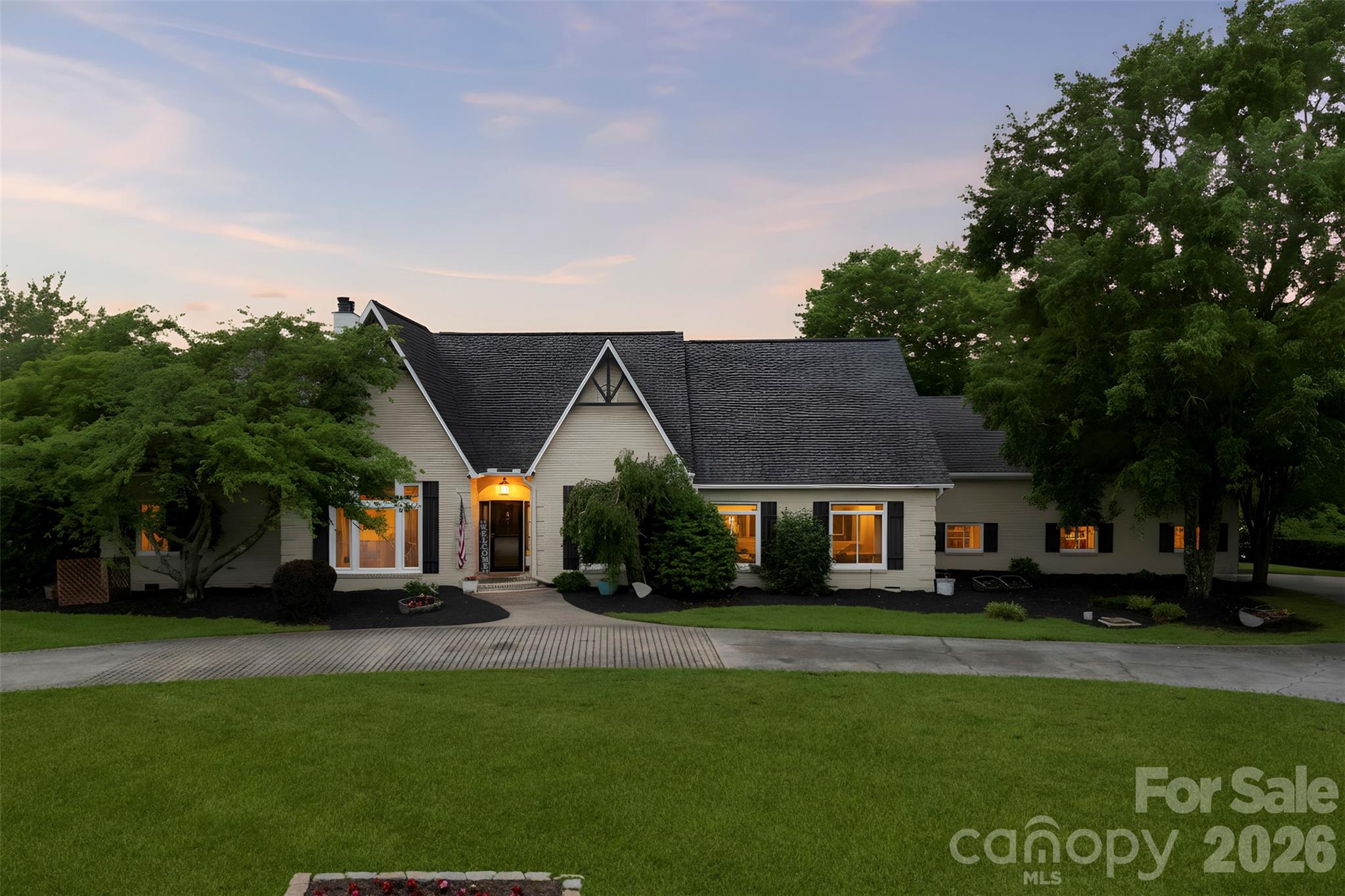 Welcome to 231 Pennington Road, where everyday living feels connected to the outdoors. Situated on 2.27 acres overlooking a peaceful pond with year-round water views, this property offers a setting designed for gathering, relaxing, and creating lasting memories. 
The backyard retreat is built for enjoying every season, featuring a saltwater pool, oversized deck, two built-in fire pits, and an in-ground gas grill.  Creating multiple spaces to entertain or unwind. 
Inside, this full brick home offers approximately 3,997 total heated square feet with an open layout, kitchen island, study, sunroom, and multiple spaces designed for both everyday living and hosting guests. The main property includes 3,268 square feet, one and a half story, offering 3 bedrooms and 2 full / 2 half baths. 
A standout feature is the connected second living quarters with a separate entrance, kitchen facilities, and living space hosting 729 square feet with a full bedroom and bath.  Offering flexibility for a variety of living arrangements and uses. 
Additional features include detached garage parking, circular driveway, backup generator, fireplaces, and location within Silver Lakes with convenient access to surrounding amenities.