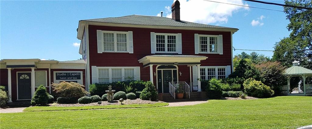 Beautifully renovated former residence is home to an upscale salon and office rentals. Hardwood floors, high ceilings, lovely courtyard with gazebo and plenty of parking. Close to town between Hendersonville and Flat Rock. Contact broker for rental income information. Contact broker directly for showing.
