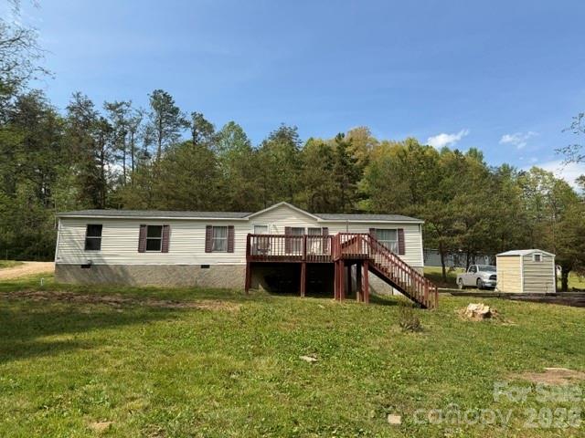 Excellent opportunity to own real estate in WNC! Here is a move in ready home with a split floor plan and plenty of space for a huge garden! While the home itself could use some upgrades, the location is perfect, it sits on a generous .62 acre mostly level lot and it's priced accordingly. There's a stream at the edge of the meadow and the house is NOT in a flood plain nor did it have any Helene damage. Bottom line: This property is a solid value and great investment! Prequal req. to show. Call today!