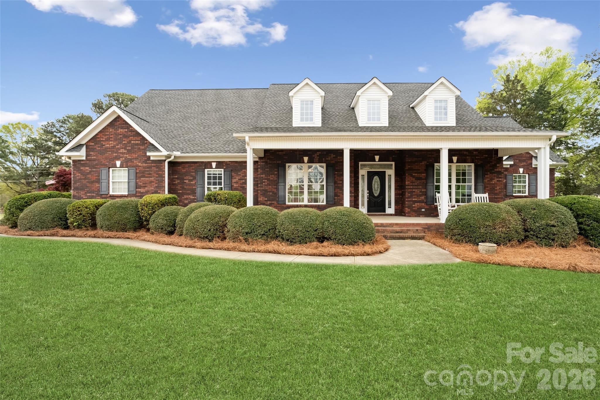 Imagine waking up to endless views of the rolling greens right in your backyard. Located in the Country Club Estates, this home offers a rare lifestyle defined by 747 feet of premier golf course frontage. Your backyard oasis, complete with a sparkling pool, is the ultimate setting for summer afternoons or quiet morning coffees on the rear porch. Inside, the open floor plan is designed for both grand entertaining and comfortable daily living. The heart of the home is a kitchen featuring a gas cooktop, double ovens, and a large island that flows seamlessly into a sun-drenched living area. Retreat to the primary sanctuary, where a lit tray ceiling and a spa-like bathroom with a whirlpool tub await. The upper level is an entertainment dream with a massive rec room with a kitchenette, alongside an expansive 18' x 45' bonus room. This versatile space functions perfectly as a fifth bedroom—ready for a custom armoire or wardrobe—or a massive home theater and gym. From the welcoming front porch to the epoxy-finished garage, every detail is crafted for comfort. This isn’t just a house; it’s your private retreat.