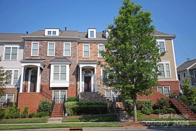 This lovely executive-level, fully furnished townhome sits in one of the most sought-after locations within super popular Baxter Village. Granite countertops, Stainless steel appliances, hardwoods, high end furnishings. Includes all utilities and Baxter amenities. Enjoy the open flow layout and relaxing off the back deck. Faces ponds and backs to wooded area. Walking path down to the water with benches and places to picnic. Nearby walking path also goes to local Elementary School and finishes near the Baxter Town Center, which includes a Starbucks, wine bar, restaurants, Fort Mill library, fitness center and boutique shopping.  Phenomenal amenities also include miles of paved trails threaded throughout the community, two outdoor swimming pools, tons of open green space areas, pocket parks, a set of tennis courts, and so much more!