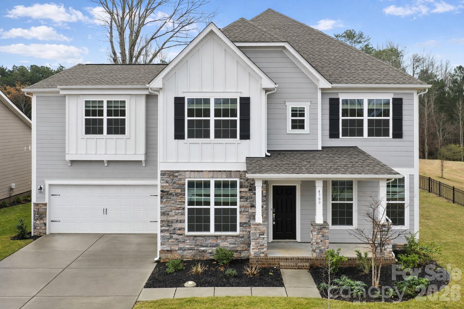 Rare 2023-built home on an oversized 0.35-acre lot in one of Waxhaw's most sought-after communities — zoned for the 9/10-rated Waxhaw Elementary School and move-in ready today.

With over 3,500 square feet across two thoughtfully designed levels, this 5-bedroom, 4.5-bath home delivers the space and flexibility modern families want. The heart of the home is a chef's kitchen built for entertaining — quartz countertops, a large center island, gas range, subway tile backsplash, walk-in pantry, and a seamless flow into the bright family room with gas fireplace. Hosting guests? A dedicated main-floor bedroom with full bath means everyone has their own space.

Upstairs, the primary suite is a true retreat — spacious bathroom, large walk-in closet, and the privacy you've been looking for. Three additional bedrooms, multiple bathrooms, and a generous bonus/loft area give you the flexibility for a media room, playroom, or home office. Laundry is conveniently located on the main level.

Step outside to one of the largest lots in the neighborhood — nearly a third of an acre with real room to breathe, play, and entertain. The covered front porch and attached 2-car garage round out a home that's as practical as it is impressive.

All of this sits inside MillBridge, an award-winning master-planned community in Waxhaw offering resort-style pools, a clubhouse, fitness center, tennis courts, putting green, playgrounds, and miles of walking trails. Freshly painted, professionally cleaned, and priced to move — this is the one you've been waiting for.