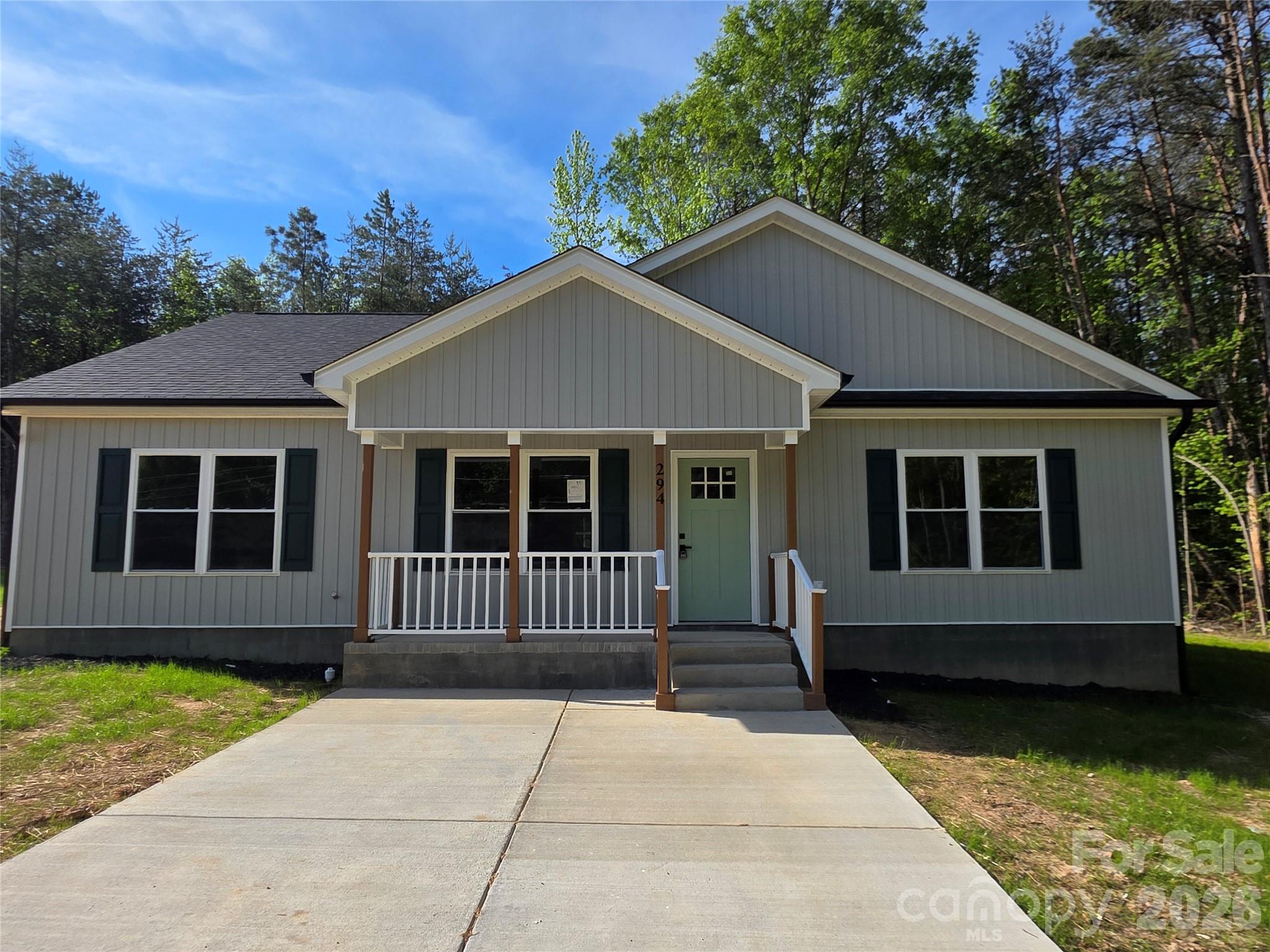 MOVE-IN READY, BRAND NEW HOME!  This cozy 1596 sq ft, single story, virtually staged, 3br 2 ba, that sits on 1.67 +- acres and is located in a quiet, well established, community near the town of Clover.  With tall trees and a wooded area, you'll find privacy.  It is an all electric home.   The property is tastefully positioned to enjoy the proximity to downtown Clover, cafes, coffee shops, restaurants, shopping, and it offers a selection of great schools in South Carolina that the homeowner may be able to take advantage of.  It is approximately 45 minutes from Charlotte Douglas Airport.  It is close to Charlotte, Rock Hill, Fort Mill, Gaffney, SC and its outlet mall.  This would be a very good purchase for someone who may be just starting a family, or is looking to downsize.  If requested, the Seller has agreed to clear additional land that is on the property for an acceptable offer.  Seller willing to pay buyer's closing cost with good offer. Come see it TODAY!