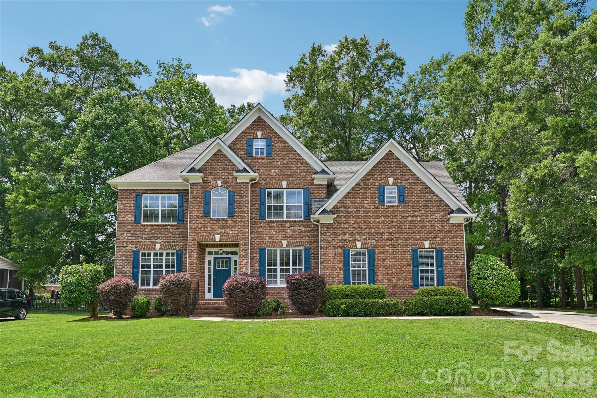 Welcome to Emerald Lake Golf Community, where thoughtful updates and an exceptional floor plan come together in one of Matthews' most desirable neighborhoods. This beautifully renovated home offers wide-plank hardwood flooring, a spacious open-concept design, and a stunning two-story great room anchored by a cozy fireplace and abundant natural light. The updated kitchen is designed for both everyday living and entertaining, featuring quartz countertops, stainless steel appliances, stylish lighting, and a bright breakfast area overlooking the backyard.

The main level also includes a dedicated home office, formal dining room, and convenient powder room, providing flexibility for today's lifestyle. Upstairs, the spacious primary suite serves as a private retreat with a walk-in closet, dual vanities, soaking tub, and separate shower. Generously sized secondary bedrooms, multiple full bathrooms, and a large bonus room offer plenty of space for family, guests, hobbies, or a media room. Step outside to enjoy the oversized deck and private backyard, perfect for relaxing evenings, weekend gatherings, or enjoying the peaceful surroundings. Located in the sought-after Emerald Lake community with golf, tennis, swimming, and convenient access to shopping, dining, and top-rated schools, this move-in-ready home offers the perfect blend of comfort, style, and location.
