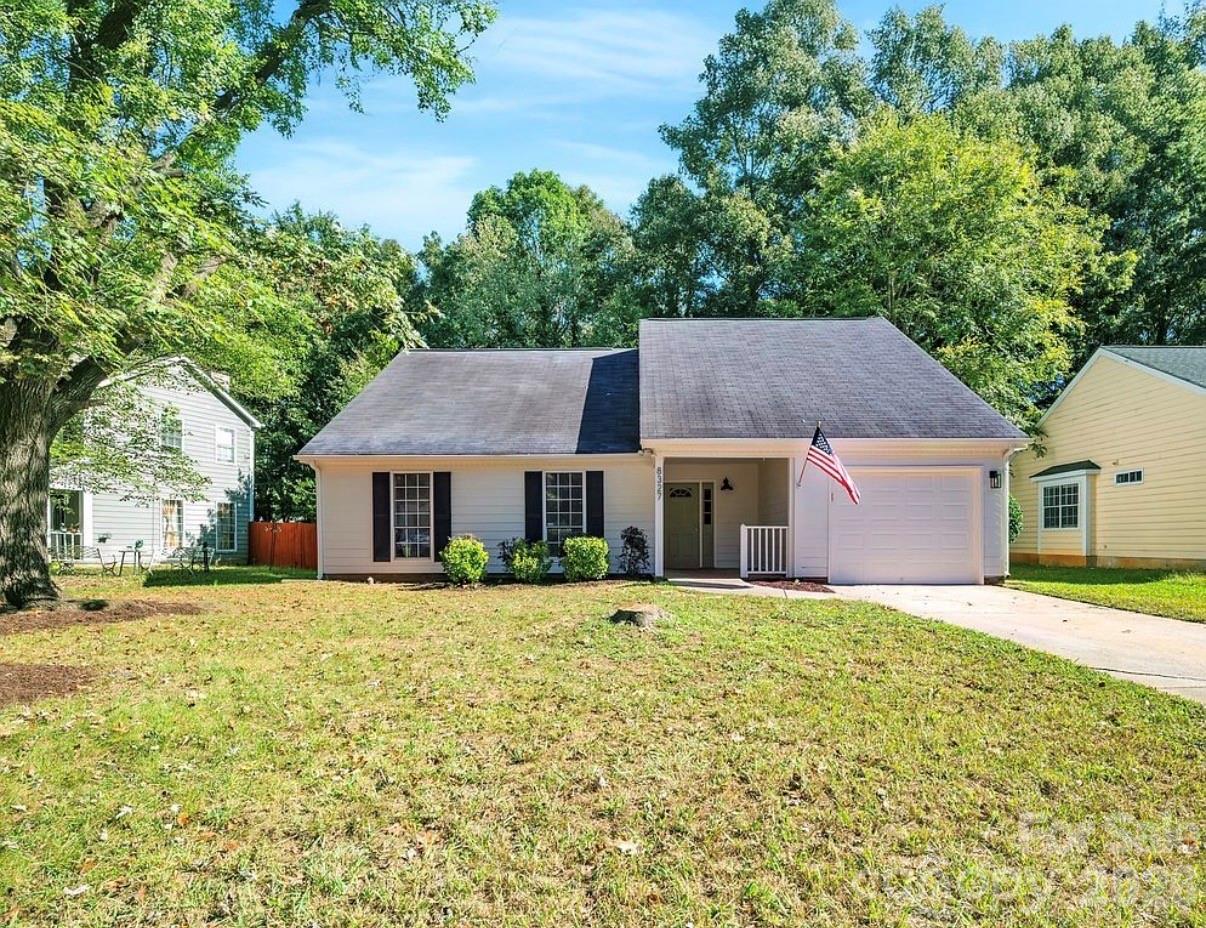 Beautiful single family home on a large lot. Huge amount of natural light with high cathedral ceilings. Tranquil wooded surroundings, in popular Morris Farms neighborhood, close to Mint Hill and only 15-20 minutes from uptown Charlotte. Complete renovation, ready for the new owner add their own touches.

- New kitchen cabinets (2025)
- New kitchen appliances (2025)
- New flooring (2025)
- HVAC unit replaced (2023)
- Water heater replaced (2022)
- Cathedral ceilings and tall windows
- Freshly painted interior and exterior
- Attached garage with work bench
- Wood burning fireplace
- Private fenced yard

Decor and furnishings and virtually staged. Kitchen appliances convey.