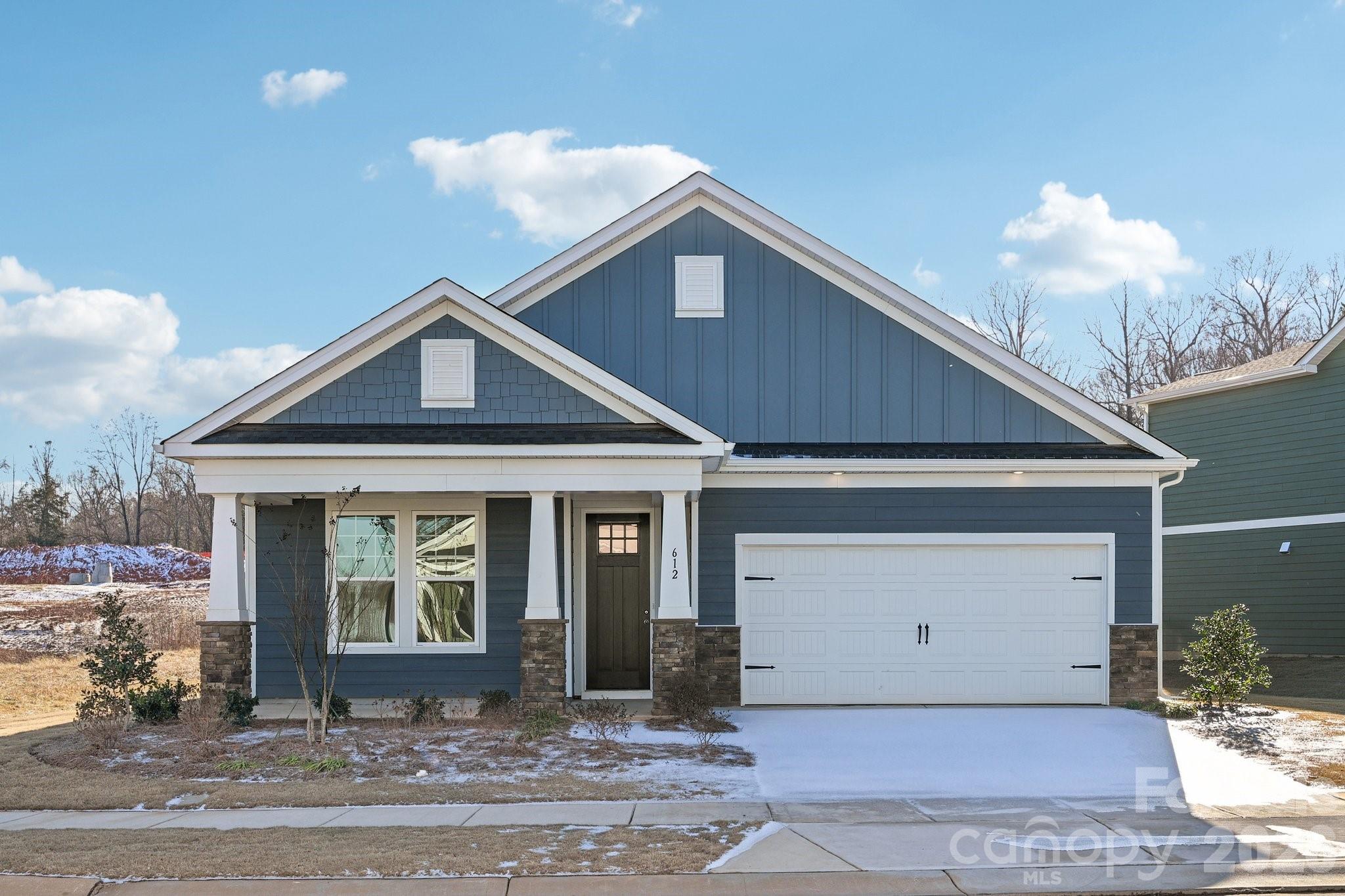 Welcome home to The Rankin, a thoughtfully designed one-story retreat where everyday living feels easy and intentional. With 3 bedrooms and 2 bathrooms on the main level, this craftsman-style home is the perfect blend of warmth, functionality, and timeless style. At the heart of the home, the chef-inspired Kitchen invites connection—featuring 42" maple-almond cabinetry with brushed gold hardware, a gas range, quartz countertops, and a seamless flow into the Great Room and Dining Room. Whether you’re preparing a quiet weeknight dinner or hosting friends, this open layout makes it effortless to be together. Just off the Kitchen, tucked away for privacy, the Owner’s Suite offers a serene space to unwind, complete with dual vanities, a beautifully tiled walk-in shower with a semi-frameless glass door, and a spacious walk-in closet that truly feels designed for real life. Two additional bedrooms are located at the front of the home and share a full bath with a convenient tub/shower combination—perfect for guests, family, or a home office. Downstairs, the living space continues with a full, finished walk-out basement featuring 9-foot ceilings, an additional bedroom, and a full bathroom—ideal for guests, multigenerational living, or a private retreat. This level also includes unfinished storage space, offering flexibility and room to grow while keeping everything neatly organized. Start your mornings on the covered front porch with a cup of coffee, or end the day relaxing outdoors after parking in the generous two-car garage. Every space in The Rankin is designed to feel comfortable, welcoming, and easy to enjoy. Located in a charming new single-family home community in Cramerton, North Carolina with only 39 homesites, you’ll be surrounded by natural beauty, wooded views, and small-town charm—without sacrificing convenience. 

Just minutes from Cramerton’s riverside town center and nearby Belmont’s dining, shopping, and pubs, residents enjoy a vibrant small-town lifestyle with easy access to Uptown Charlotte’s world-class amenities.

**Photos & Tour are Representational**