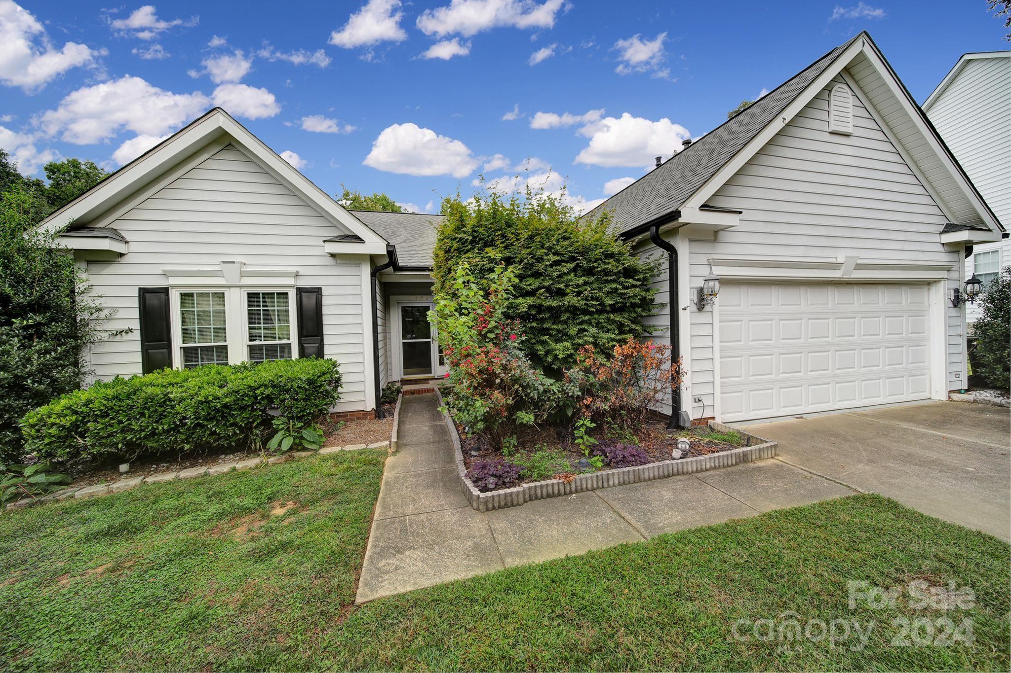 Opportunity awaits! This 3 bedroom ranch home, located in the established Whitegrove subdivision, offers a great opportunity for customization. It features a formal dining area or flexible space upon entry,  as well as two bedrooms and a bathroom at the front of the home. It is a split floor plan with the primary bedroom on the other side which includes an ensuite bathroom with a garden tub, standing shower, and walk-in closet. The kitchen overlooks the dining area and a spacious living room with vaulted ceilings and gas fireplace. Off of the kitchen, a screened-in porch leads to a deck and a fully fenced backyard. Also the AC was installed 2021, and new furnace in 2024. Don't miss your chance to get a solid home with tons of potential to make it your own. Close to schools, shopping, and dining and just minutes from I-77.