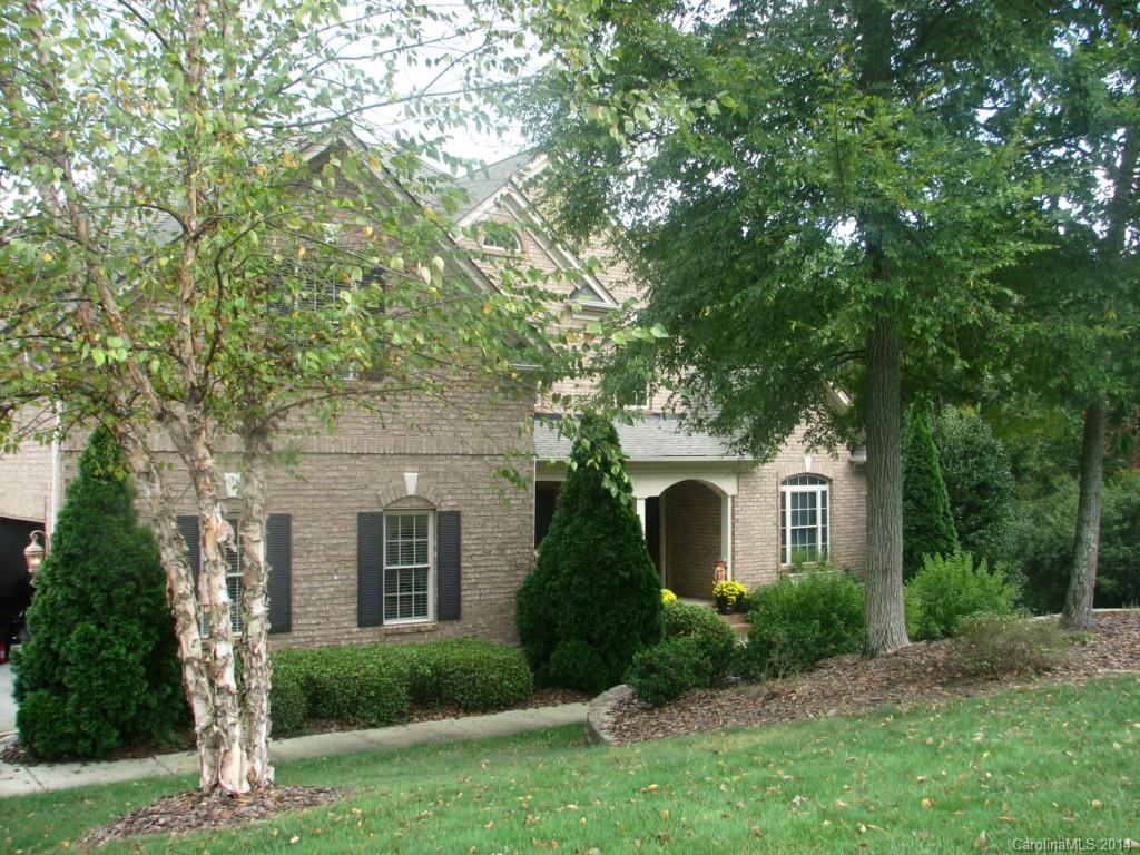 Custom waterfront home featuring 4 bedrooms & 4.5 baths. Open & spacious gourmet, eat-in kitchen with keeping room. Oversized master with luxury bath, jetted tub, dual sinks, large walk-in shower with dual heads. Great room with gas fireplace. Hardwoods throughout. Walkout lower level, great for entertaining on the lake. Patio overlooks landscaped, irrigated backyard on deep water cove. Fantastic dock with gazebo. Workshop. A waterfront home you will want to call your own! Clover Schools!