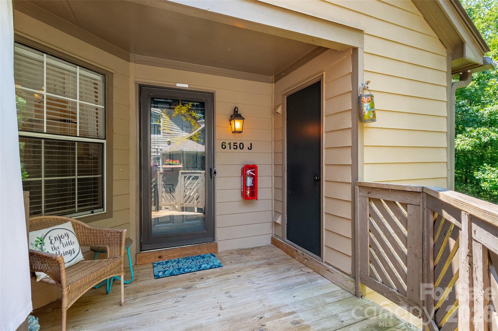 Tucked away in a hidden gem community in the coveted Quail Hollow area, this third-floor condo offers a rare feeling like the city hustle doesn't exist here. Embraced by a beautiful canopy of trees wrapping the neighborhood in shade and stillness. Conveniently located minutes from the upscale SouthPark Mall, the South Blvd light rail station, Uptown Charlotte, Quail Hollow golf course, and fine dining & retail options are all a short drive away. Step outside to the Little Sugar Creek Greenway walking distance away where morning jogs and evening strolls become part of your everyday rhythm. Wildlife peeks through the tree line, and summer stays cool beneath the lush canopy. Inside, freshly painted walls and an open-concept layout flow beneath soaring vaulted ceilings in the living room, with updated designer lighting throughout. The sun-drenched sunroom with bay windows is your personal retreat. Perfect for a home office, reading nook, or hobby room where you are secluded away from daily distractions. This roommate friendly floorplan offers two bedrooms and two full bathrooms, while the primary suite features a walk-in closet, garden tub, and double vanities with extended counter space. HOA fees include water/sewer, landscaping, tree maintenance, roof, siding, gutter cleaning, extermination, trash, and plumbing so you can enjoy maintenance free living. Community pool included. Whether you're a first-time buyer planting roots, or someone downsizing, this move-in ready home delivers exceptional value without compromise. Tour this charming condo today!