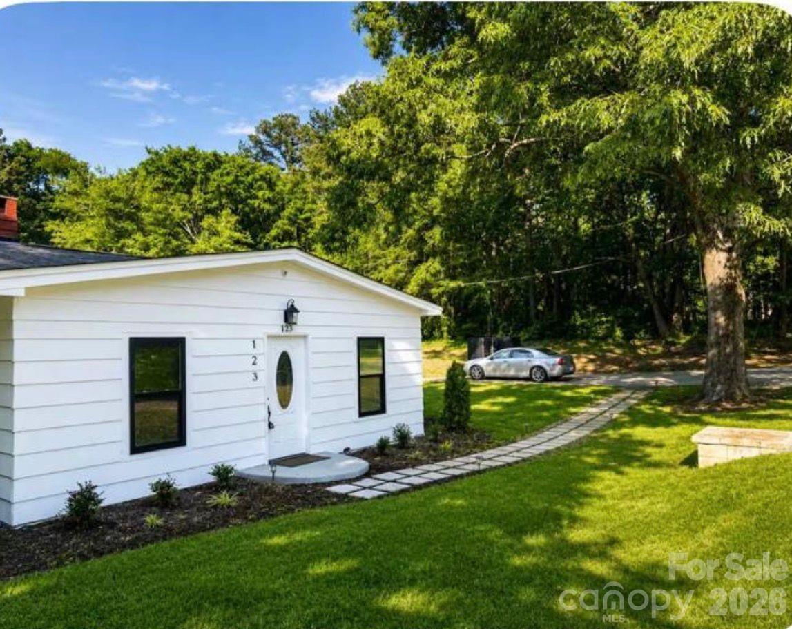 This home is currently an Airbnb. A 48-hour notice is required before scheduling a showing
Welcome to 123 Riverside Drive, Mount Holly, NC, a beautifully renovated home located in a desirable Mountain Island Lake area neighborhood (not waterfront).
Public records reflect 3 bedrooms and 2 full bathrooms; however, the home also features an additional finished room that can be used as a home office or optional bedroom, offering flexible living space to fit your needs.
his home is currently an Airbnb. A 48-hour notice is required before scheduling a showing
The home has been updated, including a bright, modern kitchen, two bathrooms, fresh finishes, and an open, inviting layout.

There is NO HOA, and the property is located in a lake-area community. A nearby public boat ramp with free access provides convenient enjoyment of Mountain Island Lake, ideal for boating, fishing, and recreation—without private fees.

Conveniently located near shopping, dining, and major highways, this home offers the perfect combination of lake-area living, flexibility, and freedom.
property is close to 77 and 485