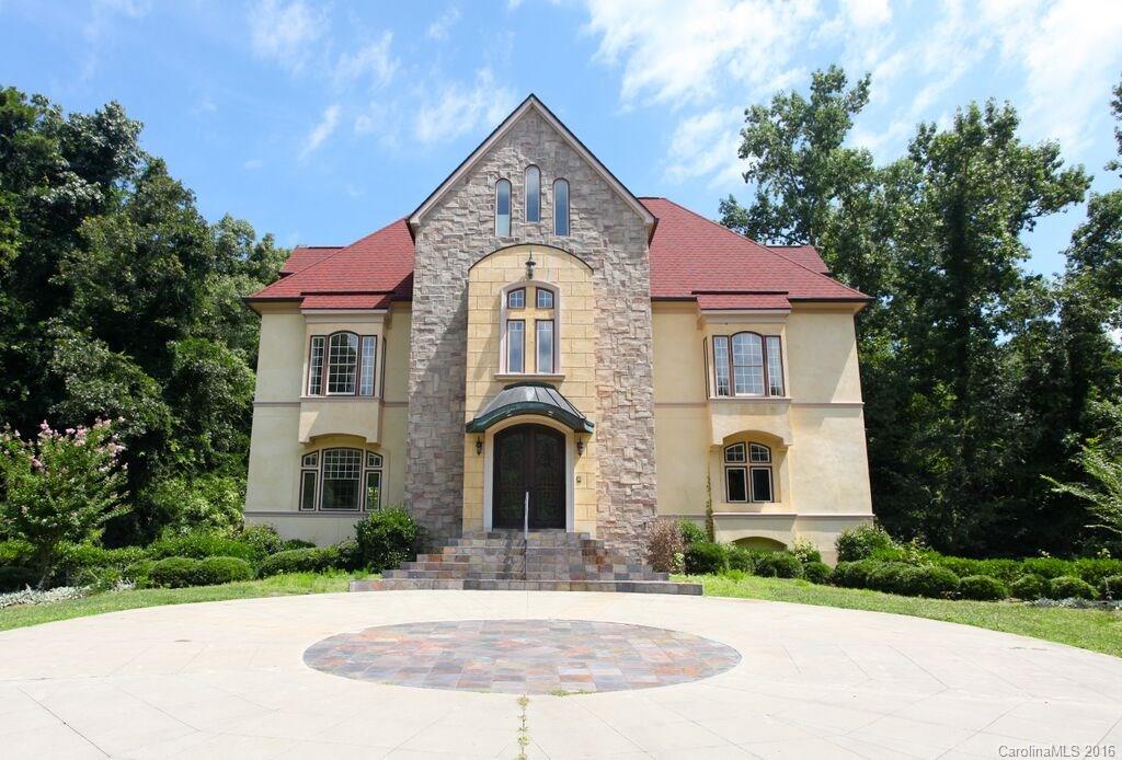 Custom European style home is absolutely loaded with features. Sitting on nearly 2 acres of private, this home boasts a stunning master suite with built in wet bar & expansive master bath, fireplace on all upper levels, high end chef's kitchen, gleaming hardwoods throughout main and lower levels, 3 dishwashers, an elevator, hand painted columns in great room. Convenient to shopping & dining. Great schools.  NOTE: LEASE PRICE IS FOR 2 YEAR LEASE.