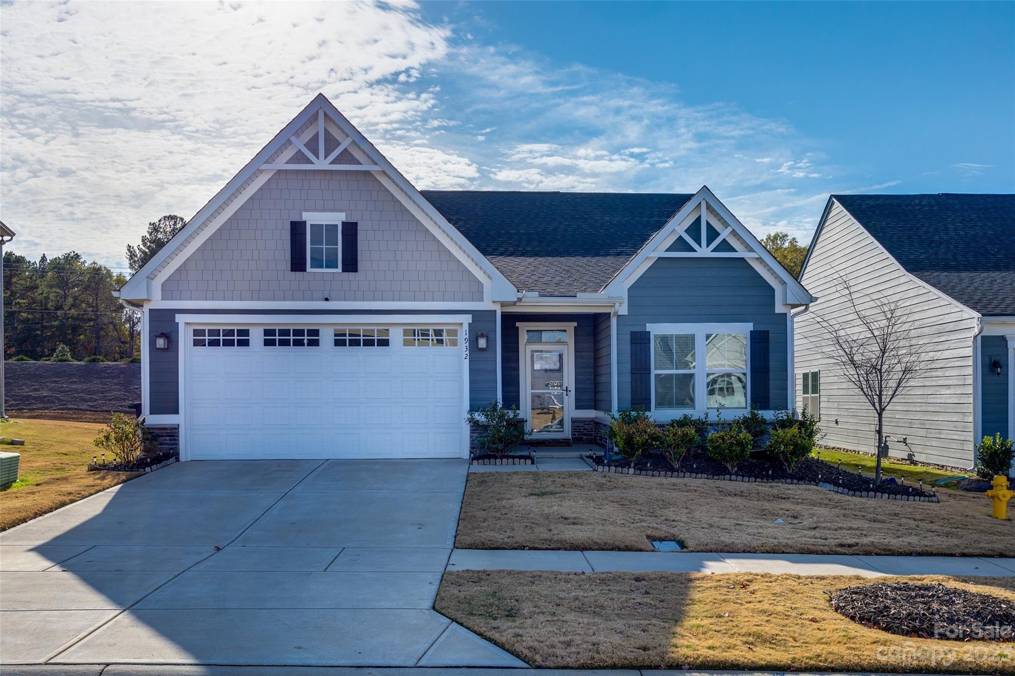 Immaculate Ranch in Monroe! This well-maintained home in the Cottage Green neighborhood has a neutral color palette that provides a blank canvas for your personal style. The open floor plan creates a seamless flow throughout the main living areas, all with LVP flooring. The kitchen features a large island with convenient seating, stainless steel appliances, and subway tile backsplash. Head outside to the expansive, fenced backyard to enjoy entertaining or relaxing on the patio. All lawn maintenance is included with the HOA dues! A two-car garage and extra utility closet offers plenty of storage space. Easy access to US-74 for commuting to work or running errands. Immaculate, inviting, and ready to welcome you home—schedule a showing today!