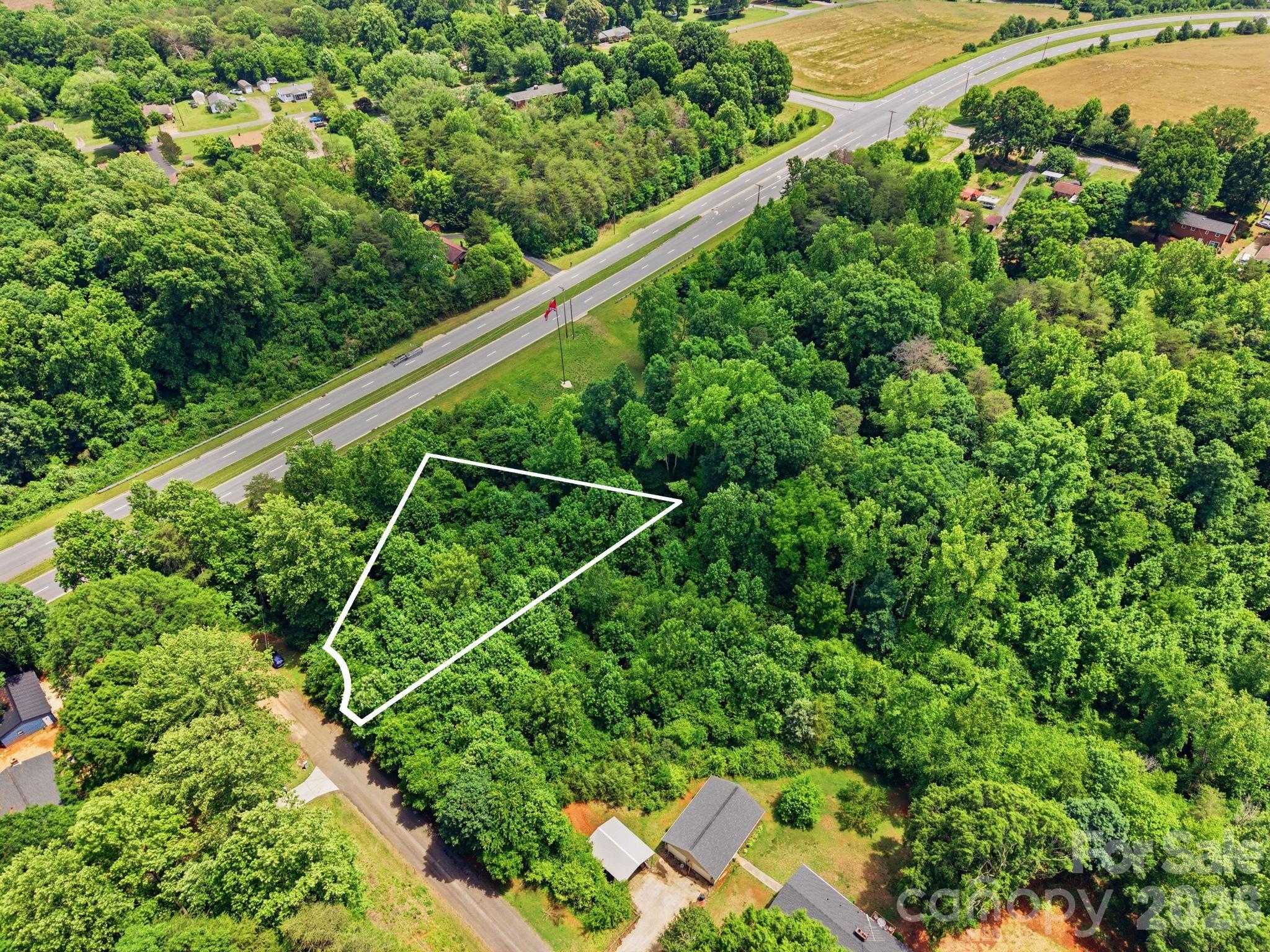 Build your dream home on this spacious 0.44-acre homesite in the established Eastway subdivision in the heart of Newton. Conveniently located near the intersection of Hwy 16 and Hwy 10, this property offers easy access to Downtown Newton, Hickory, and I-40, making commuting and everyday amenities just minutes away. City water is available, and with recently sold homes in the neighborhood reaching the $300,000s, this lot presents an excellent opportunity for homeowners, builders, or investors. An adjacent 0.60-acre lot is also available for purchase, providing the potential for additional space or future development.