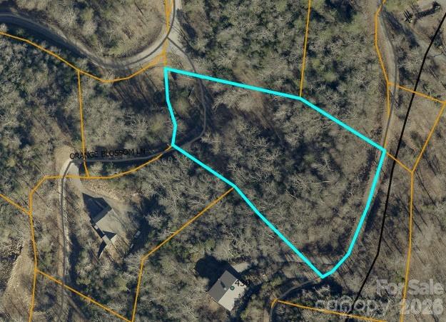 Gated community; lot has great views; ready to build your mountain home getaway!
