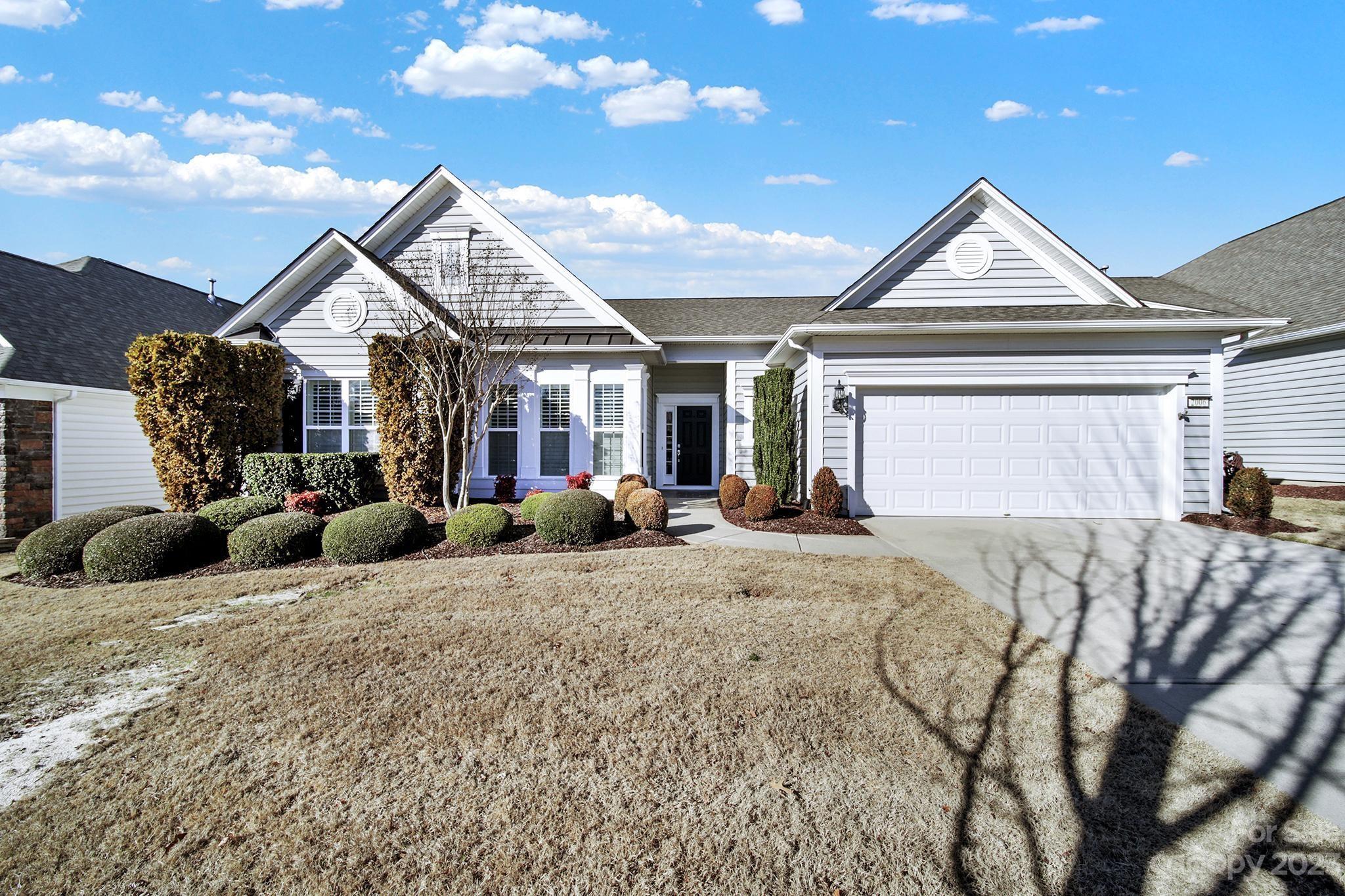 Immaculate Crestwood Meadow w/ a 3-season room & rear patio! Stunning upgrades include plantation shutters, 2 solar tubes, neutral paint, wainscoting & crown molding accents, & hardwood flooring in the living areas, kitchen, & office. Make meals in the gourmet kitchen w/ granite counters, spacious island, SS appliances (microwave/oven/fridge new in 2022), gas cooktop, cabinet roll-outs, & a desk area. Eat meals at the island, in the bkfst area, or the formal dining room! Host in the great room w/ a gas-log fireplace. The spacious primary bdrm has an en-suite bathroom w/ a dual sink vanity, garden tub, glass shower, & walk-in custom closet w/ shelves & drawers! 2 guest bdrms at the front of the home have access to a full hallway bath. The office w/ French doors is perfect for a home office. The 3-season room w/ Eze-Breeze windows has a ceiling fan & pull-down sun shades. It leads out onto the rear patio w/ a sitting wall & private view! Come be an active-adult in Sun City today!