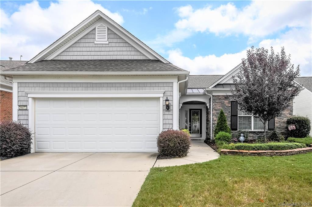 Stunning Copper Ridge model modified for handicap access at construction. Home features large master bedroom and bath, second bedroom, office/den/game room. Nicely landscaped front yard. Large fenced paver patio and mature landscaping for beauty and privacy. Very bright and airy home with many windows overlooking gorgeous patio. Ceiling fans and refrigerator remain.