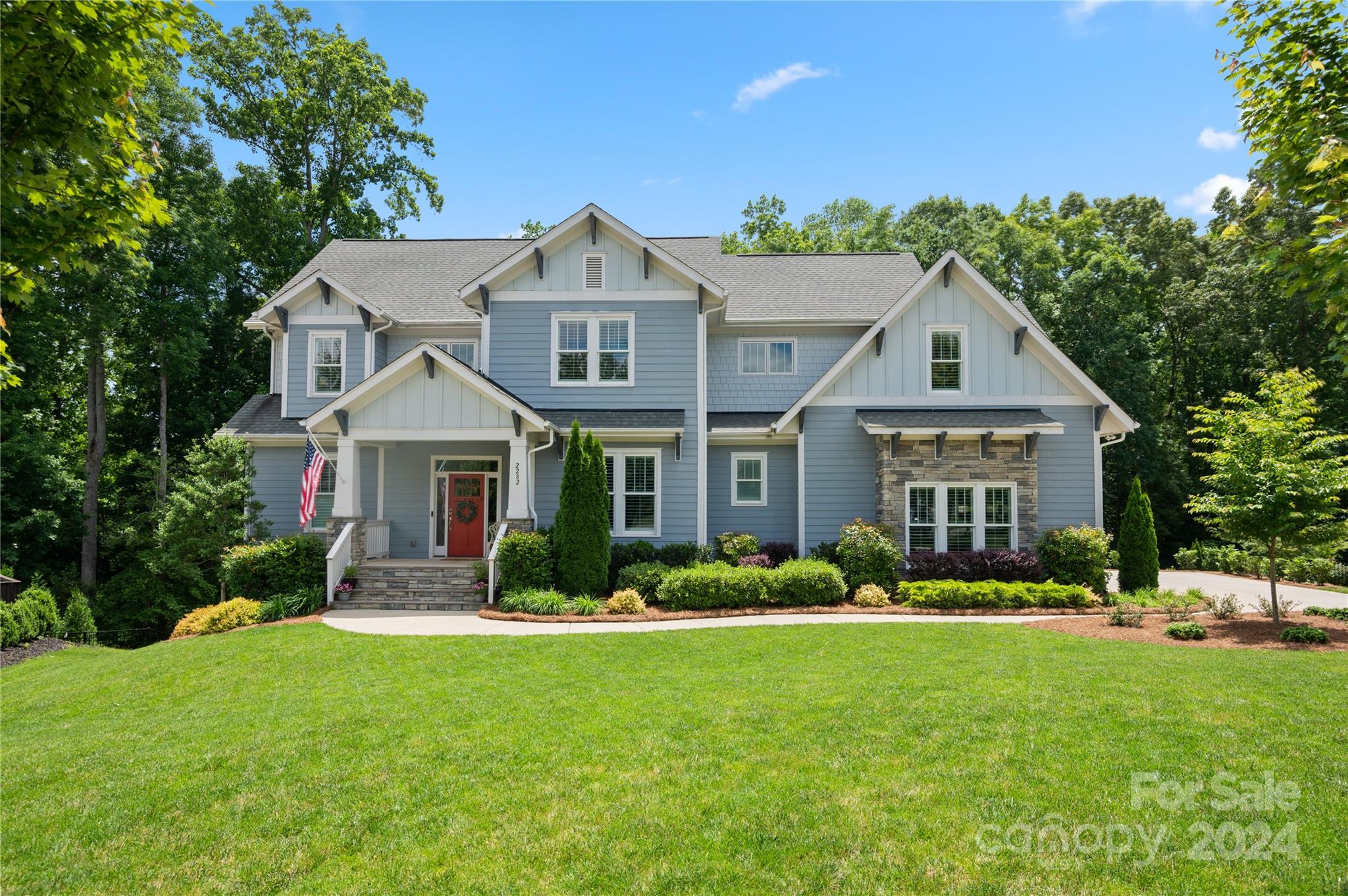 Beautiful 7 Bedroom 6.5 Bath Home w/ Open Floor plan on Rare Large cul-de-sac Lot Backing to woods in highly sought after Springfield Community w/ Pool, Tennis Courts, Walking Trails, Playground and Golf Course. 3 Car Side Load Garage. Beautiful natural back yard w/ tons of privacy. Primary Bedroom on the Main plus a Guest Suite that could be used as an office. Additional Stacker Washer & Dryer in Master Closet. Large Kitchen Island & Separate Beverage Station. Living Room w/ Beautiful Built-in Bookshelves. Huge walk-in Mud Room, Large Slider Doors Open to an Oversized Screened Back Porch. Perfect for morning coffee or afternoon entertaining w/ a gorgeous tree view! Upstairs features a Large Loft & Separate Sitting area, 3 Bedrooms, 2 Full Baths and Laundry Room w/ Sink. Newly finished Basement 2000+ square feet, 2 Junior suites, Entertaining/Bar area, State of the Art Movie Theater Room, Gym, Rec area, a Billiard /Greatroom, Large Sliders to an Additional Screened Porch. WELCOME HOME!