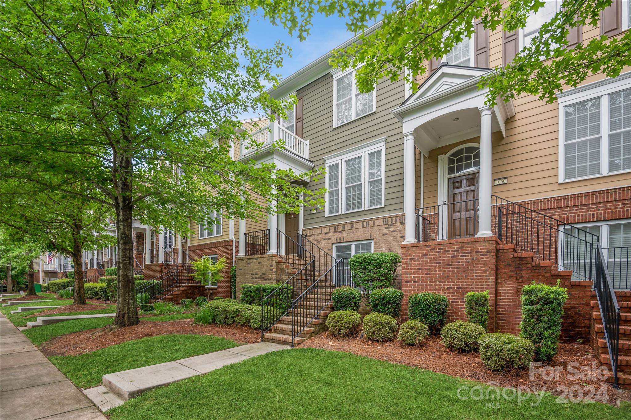 Welcome to the peaceful tranquility of this gorgeous townhome located in Baxter Village. You are getting all of the great amenities, shops and restaurants of Baxter Village Town Center while being tucked away in the neighborhood and with seasonal views Lake Elliott directly across the street. This 3 bedroom, 3 1/2 bath end unit townhome has a great open floor plan on the main level with wood floors, breakfast area and living room w/ gas fireplace. The kitchen is well appointed with great cabinet space, granite counter tops, gas stove top, stainless steel appliances and center island. The upper floor has two great size bedrooms both with full baths and the primary has a wonderful tray ceiling. The lower level of the townhome, coming in from the garage, has the third bedroom with a full bath. The  Carolina Thread Trails also wind through the natural areas in around the neighborhood and will also take you up to the Baxter Village Town Center.