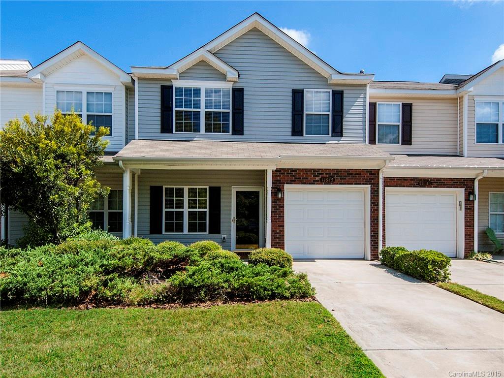 Stunning townhome in beautiful Rozzelles Landing! This one has been VERY nicely upgraded just in the last month, NEW paint, NEW carpet upstairs, and NEW breathtaking hardwood look downstairs! Large kitchen with lots of cabinets!  NEW stove and NEW dishwasher! BEST open floorplan around!! LARGE family room with gas fireplace!  Upstairs has a nice loft/playroom/study/ AND an area for office/computer niche!   Completely move in ready!!  Close to pool! CLOSE to I 485, minutes to Downtown, Shopping!