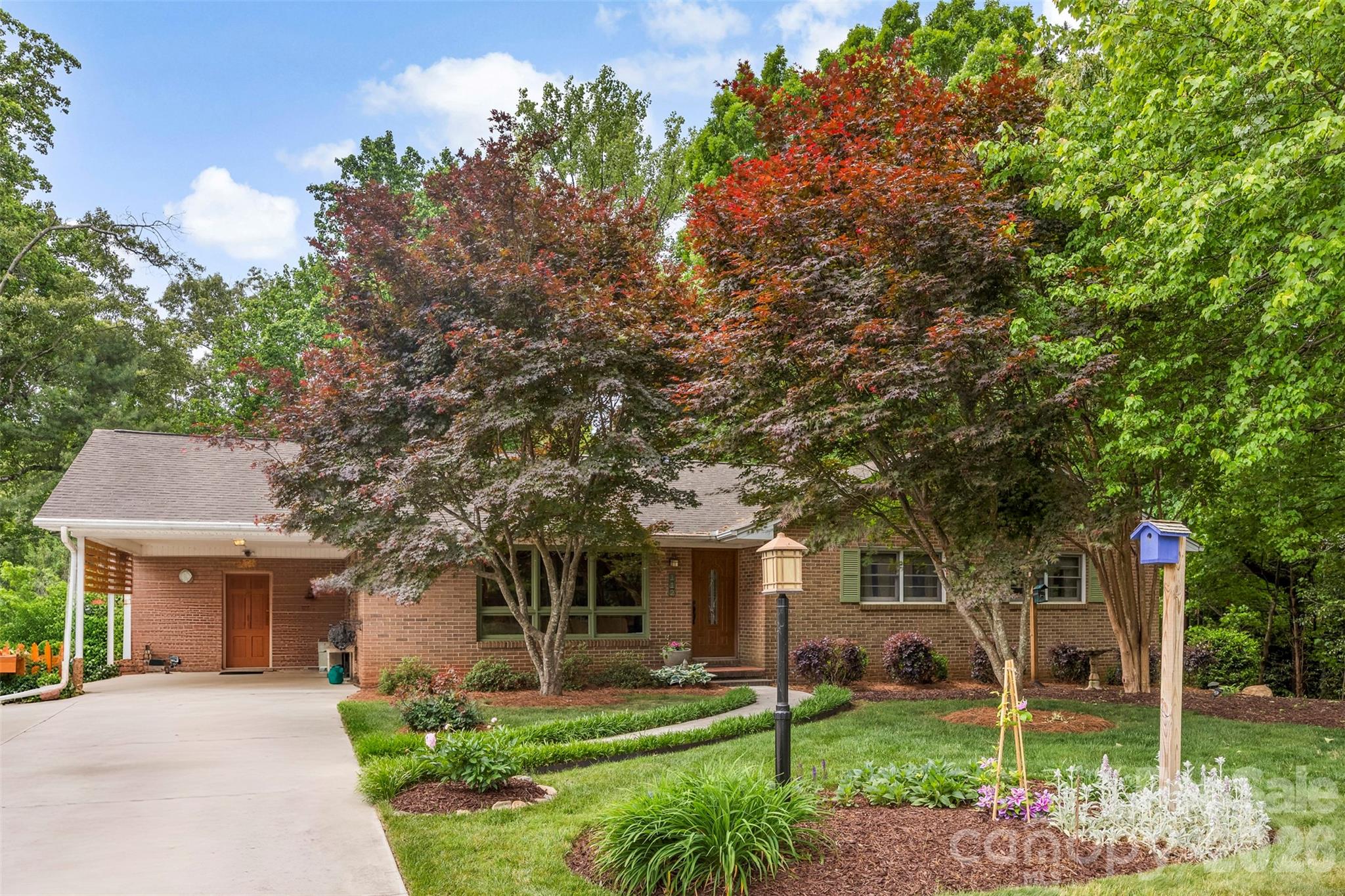 This Belmont classic has it all -- location, a magnificently landscaped .99-scre lot and a quiet, established neighborhood. With nearly 2,700 square feet of heated space, this charmer nas three bedrooms and two and a half bathrooms. All bedrooms are located on the main level, providing convenience and accessibility. The home features a spacious partially finished basement offering additional living space and versatility. The plant life surrounding property has been meticulously maintained, creating a magnificent outdoor environment. The location of the home is convenient, situated near Belmont Town Center and local schools - Page Primary, Belmont Middle and South Point High. Convenient back roads in and out of the neighborhood make for a faster commute than many other communities in this ZIP code.