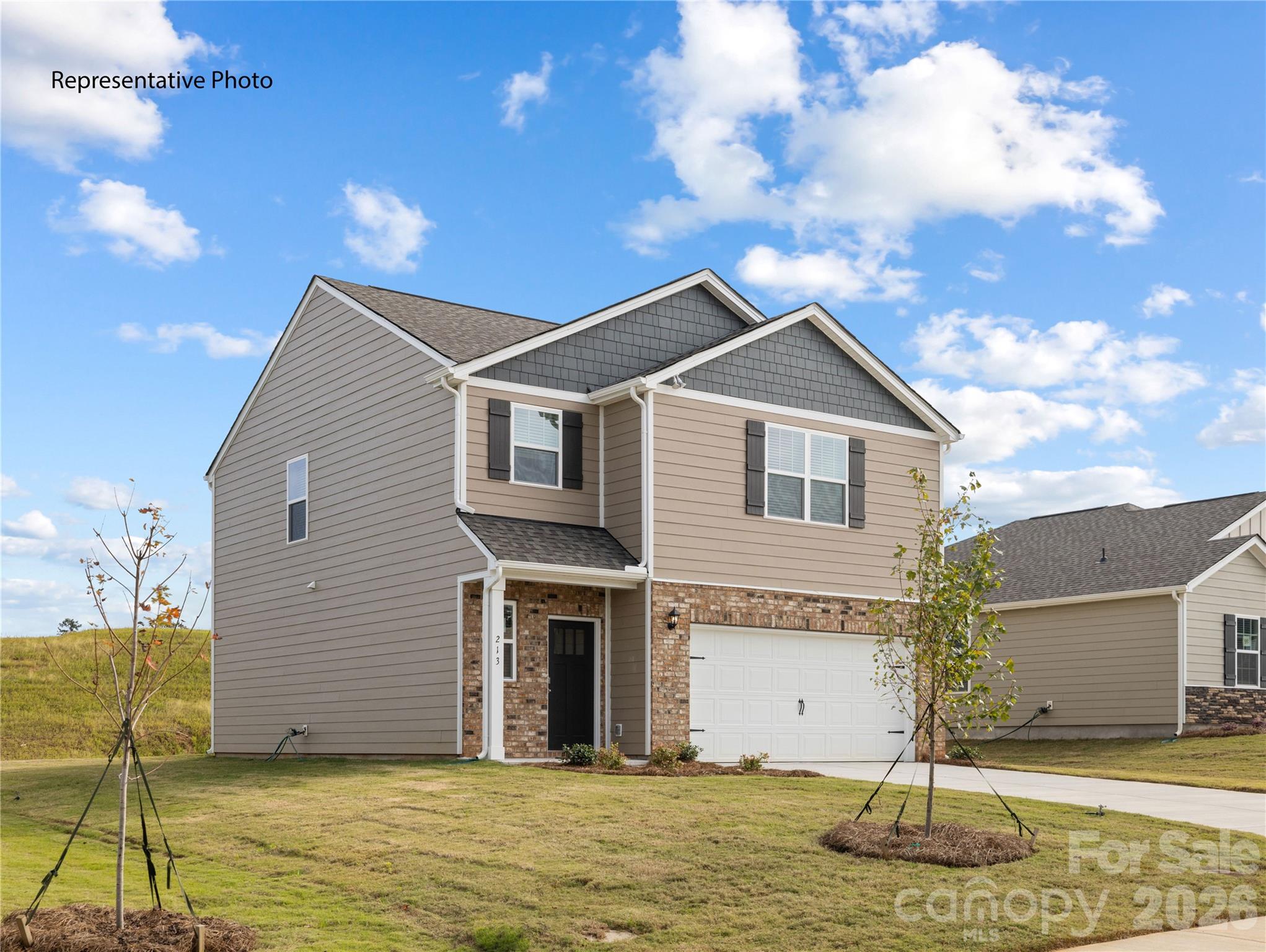 The Darwin is one of our two-story plans featured in Zion Springs in Hickory, North Carolina . The Darwin is a spacious and modern two-story home that boasts an impressive level of comfort, luxury, and style. This home offers three bedrooms, two and a half bathrooms and a two-car garage.

An open and welcoming foyer invites you into the home, leading you to the kitchen and dining room in the heart of the home. The open-concept layout connects the kitchen, dining room, and family room to foster a sense of unity and allows easy interaction for entertaining. The chef’s kitchen is equipped with modern appliances, ample storage space, a walk-in pantry, and a large center island.

Escape upstairs to the primary suite, complete with a large bedroom space, en-suite bathroom, and walk-in closet. The additional bedrooms both have walk-in closets and have access to a secondary bathroom. The laundry completes the second floor.

With its thoughtful design, spacious layout, and modern conveniences, the Darwin is the perfect home for you Zion Springs. Don’t miss this opportunity at this home, schedule an appointment today!