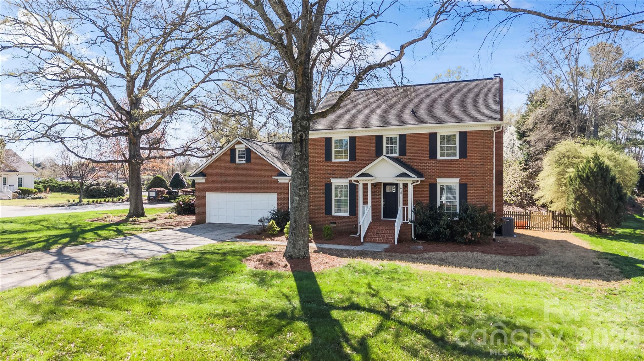 Seller is offering up to $5,000 toward buyer closing costs with an acceptable offer.  Located in the charming Quail Acres neighborhood of desirable South Charlotte, this 4-bedroom, 2.5-bath home offers space, comfort, and a prime location. Set on a generous lot with mature oak trees, the expansive front and backyard provide the perfect setting for play, entertaining, and everyday family life. The classic all-brick exterior is complemented by a two-car attached garage and additional storage. Inside, the well-maintained layout features a formal dining room, living room, convenient main-level laundry, and easy access to the garage. The spacious kitchen, highlighted by a bay window, flows seamlessly into the cozy family room with a wood-burning fireplace. New custom patio doors (2021) open to a deck and concrete patio-ideal for outdoor gatherings or creating your dream outdoor kitchen. Upstairs, you'll find four generously sized bedrooms and two full baths, offering flexibility for a home office, playroom, or additional living space to fit your needs. Major system updates add to the home's value and efficiency, including radiant barrier in attic and dual HVAC systems for year-round comfort, with a new downstairs unit installed in 2023. Move-in ready with fresh paint throughout, this home presents a fantastic opportunity to personalize while enjoying the benefits of a well-built, thoughtfully maintained property. Quail Acres is known for its quiet streets, mature trees, and access to top-rated schools. Conveniently located just minutes from I-485 and popular destinations like Waverly, The Arboretum, Stonecrest, and Ballantyne, this home combines everyday convenience with long-term value.