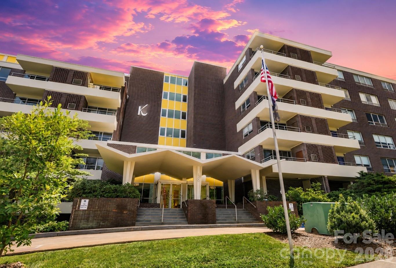 This unit offers an exceptional opportunity with a bright, open floor plan designed for everyday comfort and effortless entertaining. Recent updates include a renovated kitchen and bathroom, new flooring throughout, and fresh paint. Residents of The Kimberlee enjoy a truly carefree lifestyle. The monthly fee covers property taxes, internet, cable, water, trash, and one covered parking space, making ownership here one of the strongest values in the area. Ideally located just steps from Park Road Shopping Center, this beautifully maintained mid-century community combines timeless character with urban convenience. Enjoy immediate access to popular restaurants, cafés, boutiques, and entertainment, or connect to the Little Sugar Creek Greenway for a scenic route to Freedom Park and beyond.