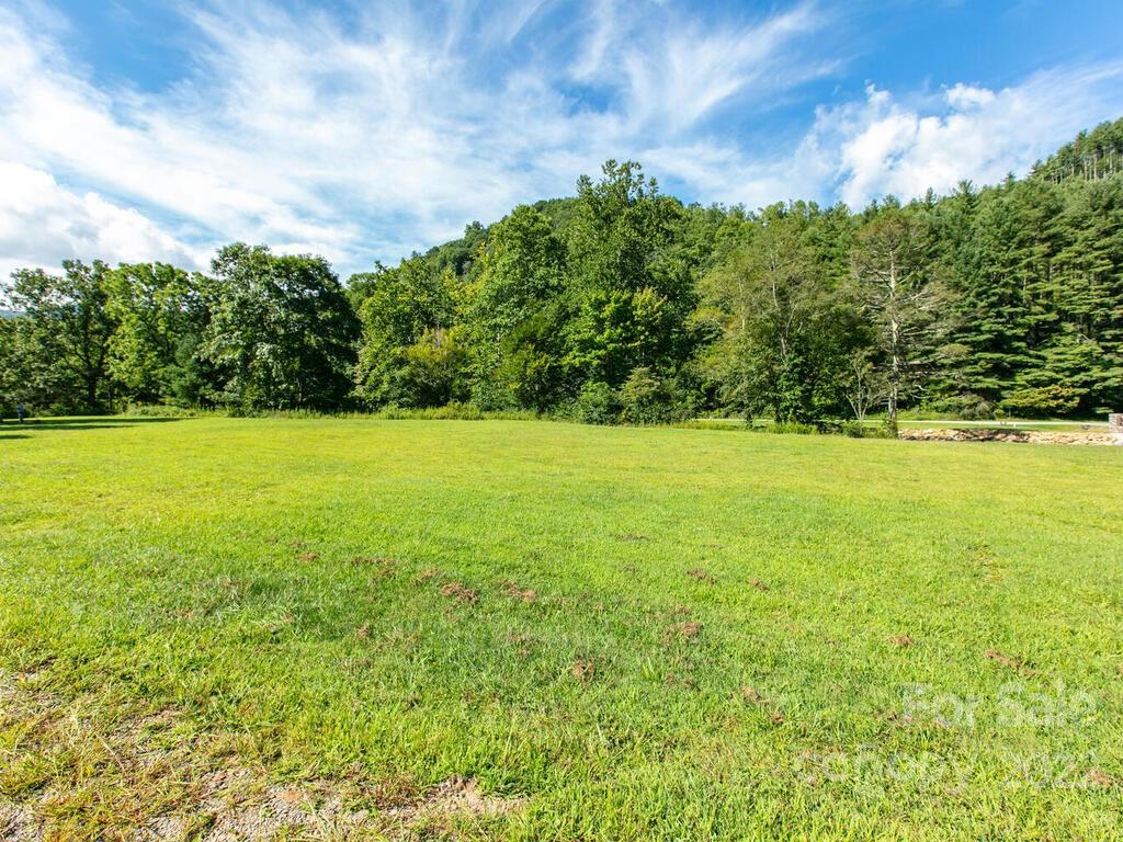 Ready to build your mountain retreat on the river? This community is well maintained and near level, which is so difficult to get in the mountains. Pair the sounds of water splashing over river rocks amidst the backdrop of the national forest and Camp Daniel Boone. Convenient proximity to drive the world famous Blue Ridge Parkway, excellent trout waters for fly fishing, and the locally famous Sunburst Trout Farm.