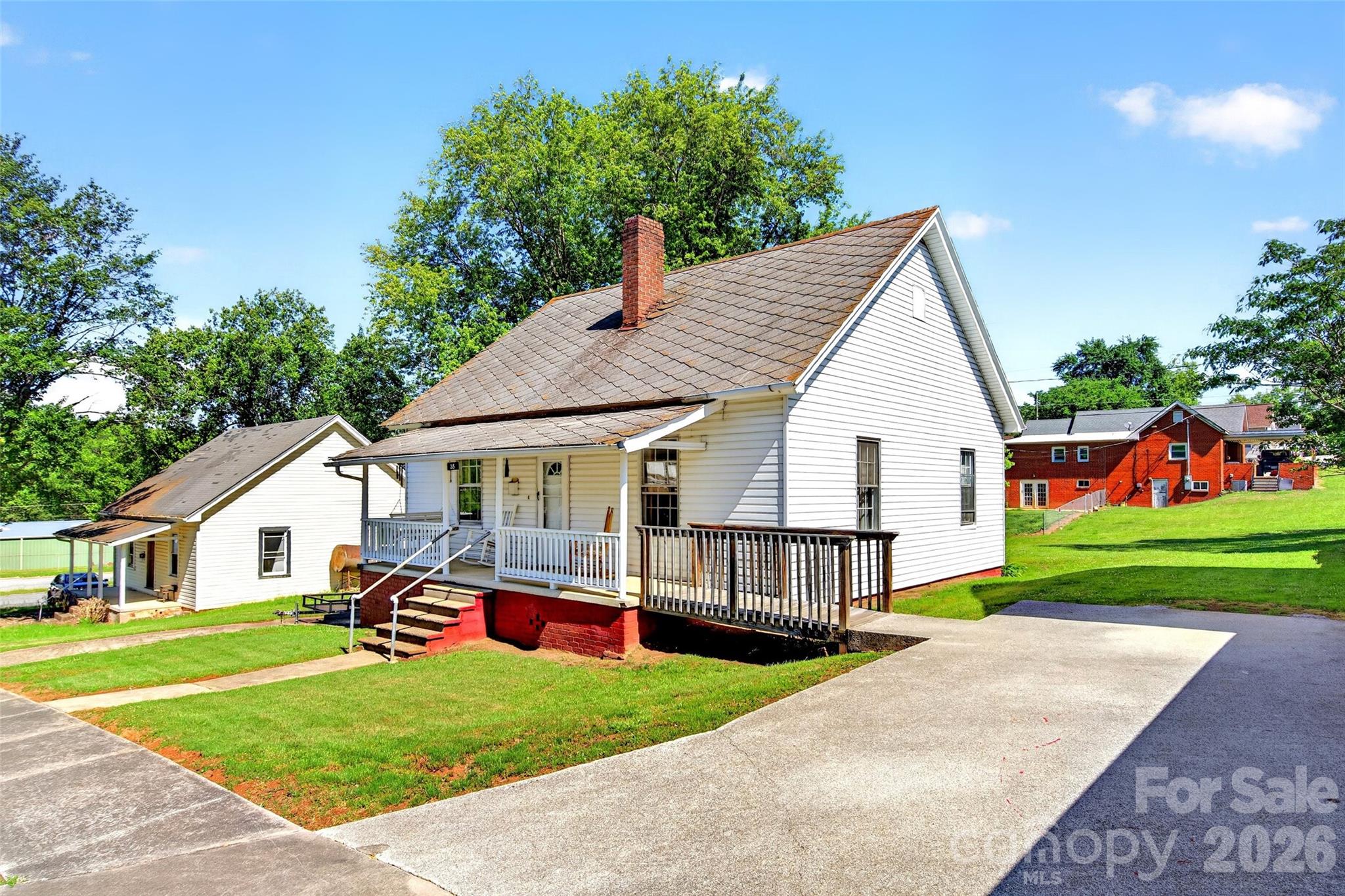 Welcome to 35 Second Street — a charming one-level home offering timeless character and everyday convenience. Enjoy relaxing on the inviting covered front porch before stepping inside to a comfortable layout featuring 3 bedrooms, 1.5 baths, and spacious living and dining areas perfect for daily living and entertaining.

Portions of the home feature original hardwood flooring, adding warmth and character throughout. The laundry area conveniently includes a half bath, while the crawlspace provides additional functionality with a small workshop area. Outside, a detached storage shed offers plenty of room for lawn equipment, tools, and extra storage needs.

Additional highlights include low-maintenance aluminum siding, two concrete driveways for easy access and parking, and a heat pump with a recently updated compressor for added peace of mind. Being sold “as is,” this property presents a wonderful opportunity to add your personal touch and make it your own.