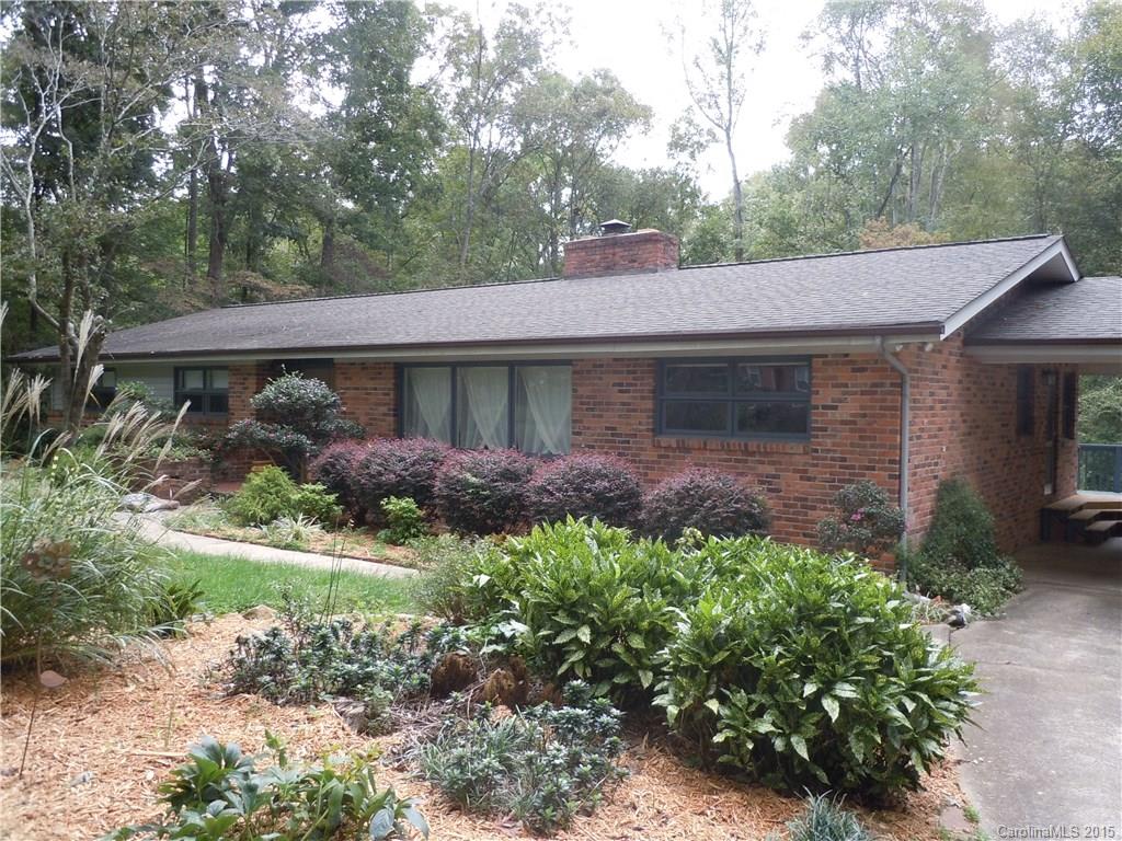Come home to your own private paradise! Brick ranch nestled on over 1.5 acre wooded lot viewing a beautiful babbling creek. Close your eyes & imagine the peaceful sounds of running water and birds singing. Feel the soft breeze while sipping your coffee on the porch each morning. Seeing is believing. Great Rock Hill location convenient to I-77, restaurants, shopping & hospital with no city tax.