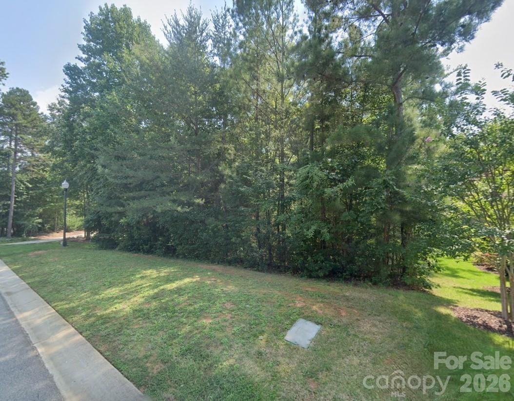 This beautiful 0.607-acre homesite in the desirable Lakewood subdivision offers a peaceful setting in the growing Denver, NC area. Surrounded by mature trees and established homes, this property provides the perfect opportunity to build your custom dream home with privacy and natural charm. Conveniently located just minutes from Lake Norman, enjoy easy access to boating, fishing, waterfront dining, parks, and outdoor recreation. Denver continues to experience strong growth with nearby shopping, restaurants, and everyday conveniences while still offering a quiet suburban lifestyle. With close proximity to Charlotte and major commuting routes, this lot combines location, lifestyle, and value. A rare opportunity to own a spacious homesite in one of Denver’s sought-after communities at an attractive price point.
