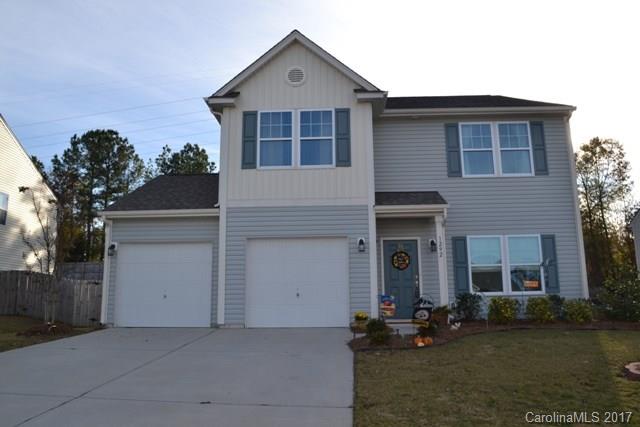 Great home in the Oaks at Clover neighborhood.  This home offers a huge great room that is perfect for large families, granite kitchen with stainless appliances and tile back splash.  There is also an office/bonus room on main level.  Upstairs houses all the bedrooms plus the laundry room and a loft area.  Great outdoor living with a fenced back yard, patio and fire pit.  The property goes past the fence line.  Easy and quick access to the high school.