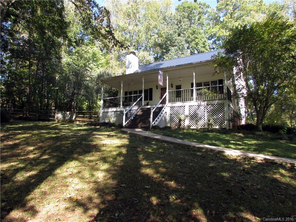 Get ready to start marking off your checklist. This one's got it all. A quiet, country setting situated off the road on a cul-de-sac lot. Just over 4 acres of land for you to gaze over as you relax on the beautiful front porch. A loft master bedroom that looks out over a spacious, open kitchen and living area. Two additional bedrooms and almost 1200 square feet of rustic charm. Now, add in a chicken coop in the yard and amazing Clover schools, and your checklist is complete. Welcome home!