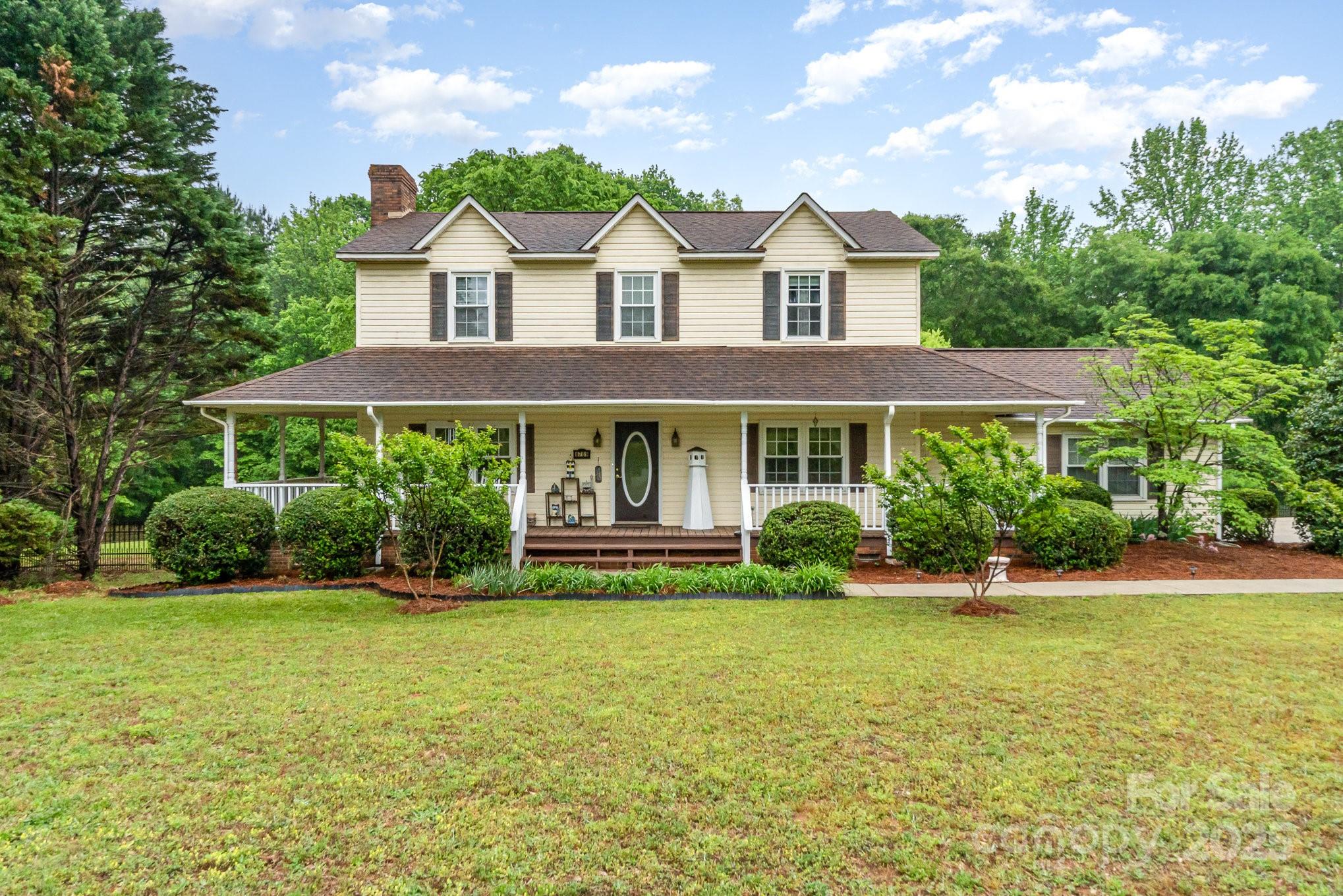 Welcome to Clover, nestled nicely between downtown Clover, Lake Wylie, York, and minutes away from the NC State Line. This home features no HOA, beautiful curb appeal, a wrap around porch, back deck, shade trees, a fenced in back yard, new vapor barrier and water filtration system in the crawlspace, Corian kitchen counter tops, marble countertops in the upstairs bathrooms, and an electric fireplace. The full bathrooms have recently been upgraded an look wonderful. There is plenty of kitchen storage, a pantry, out door storage, and of course the attached garage.