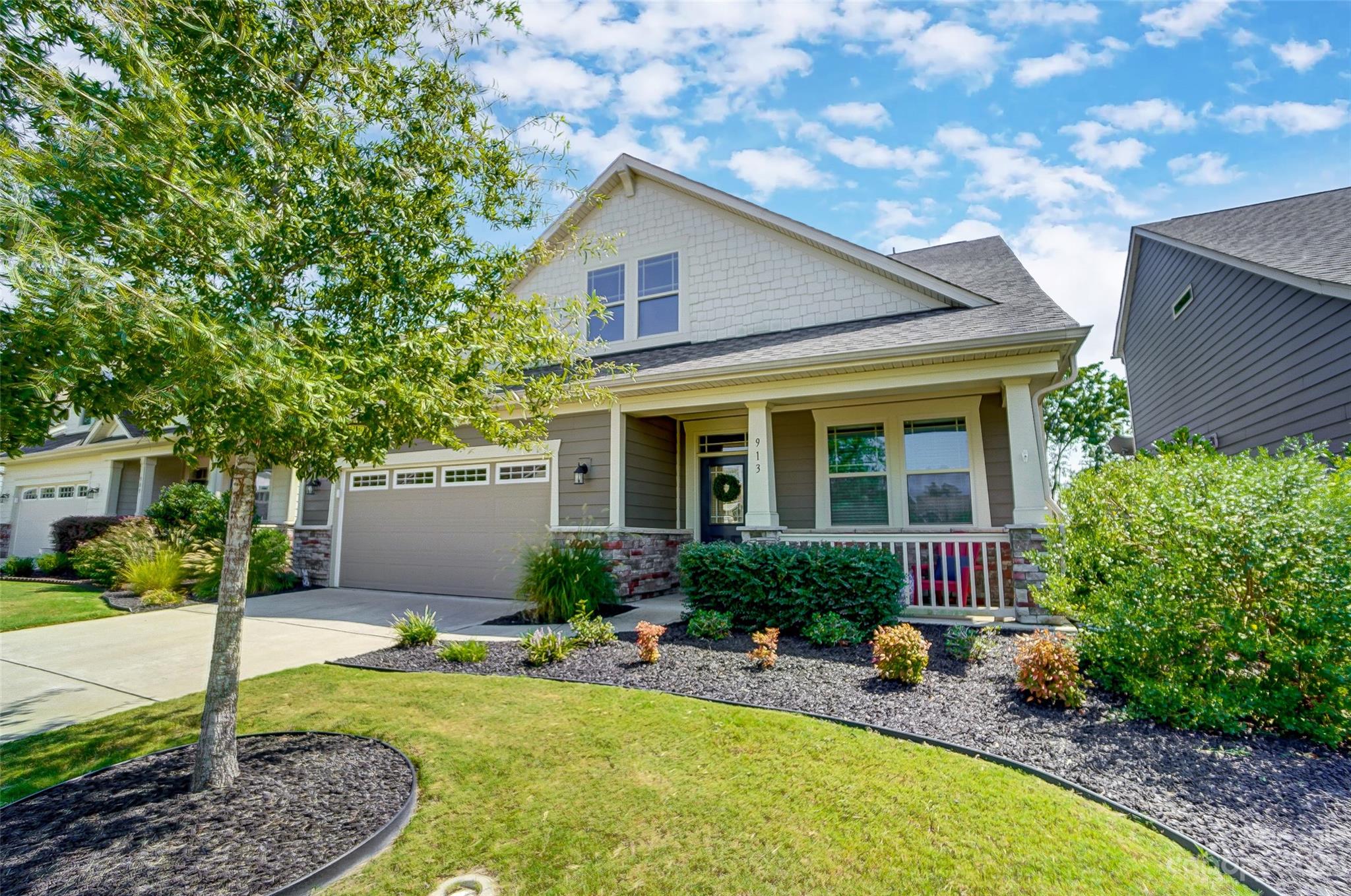Absolutely Stunning Home in the Cadence Community! Pristine and move-in ready! Step in from the front porch and into a welcoming open floor plan! The main level boasts a Gourmet Kitchen, Cozy Great Room with Gas Fireplace, a luxurious Primary Suite with an adjoining sitting room and huge walk in closet, a second bedroom suite, a Dining area, lots of windows and an amazing drop zone and laundry! Huge bonus/loft up, as well as a 3rd bedroom suite! Upgrades and impeccable finishes at every turn! Impressive cabinetry with gorgeous range hood over the gas cooktop! Floor to ceiling glass sliders open out to a side courtyard patio for endless relaxation or entertaining! Cadence features a clubhouse, an outdoor pool, sidewalks and entertaining community activities. Tega Cay offers a marina and beach/park on Lake Wylie, and access to other a la carte amenities. Fantastic location, just minutes to downtown Fort Mill, I-77 and all that Uptown Charlotte has to offer. Easy Living at its Finest!