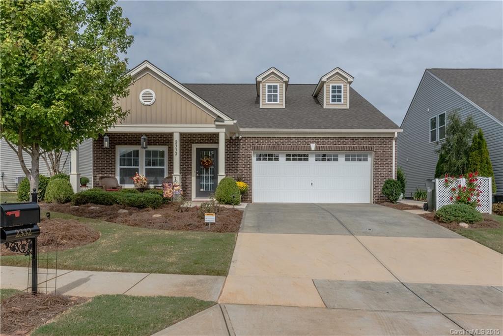 This former model home still shows like a model!  All the upgrades including hardwood floors in the living areas, granite counters, tile backsplash, upgraded cabinets, finished garage, speakers throughout the house - including the garage! Rocking chair front porch.  Covered back patio with additional open stone patio. Beautiful landscaping with irrigation. Great location with easy access to Lake Wylie, Baxter, I-77, Uptown and the airport. This beautiful ranch home is ready today! Don't miss it!